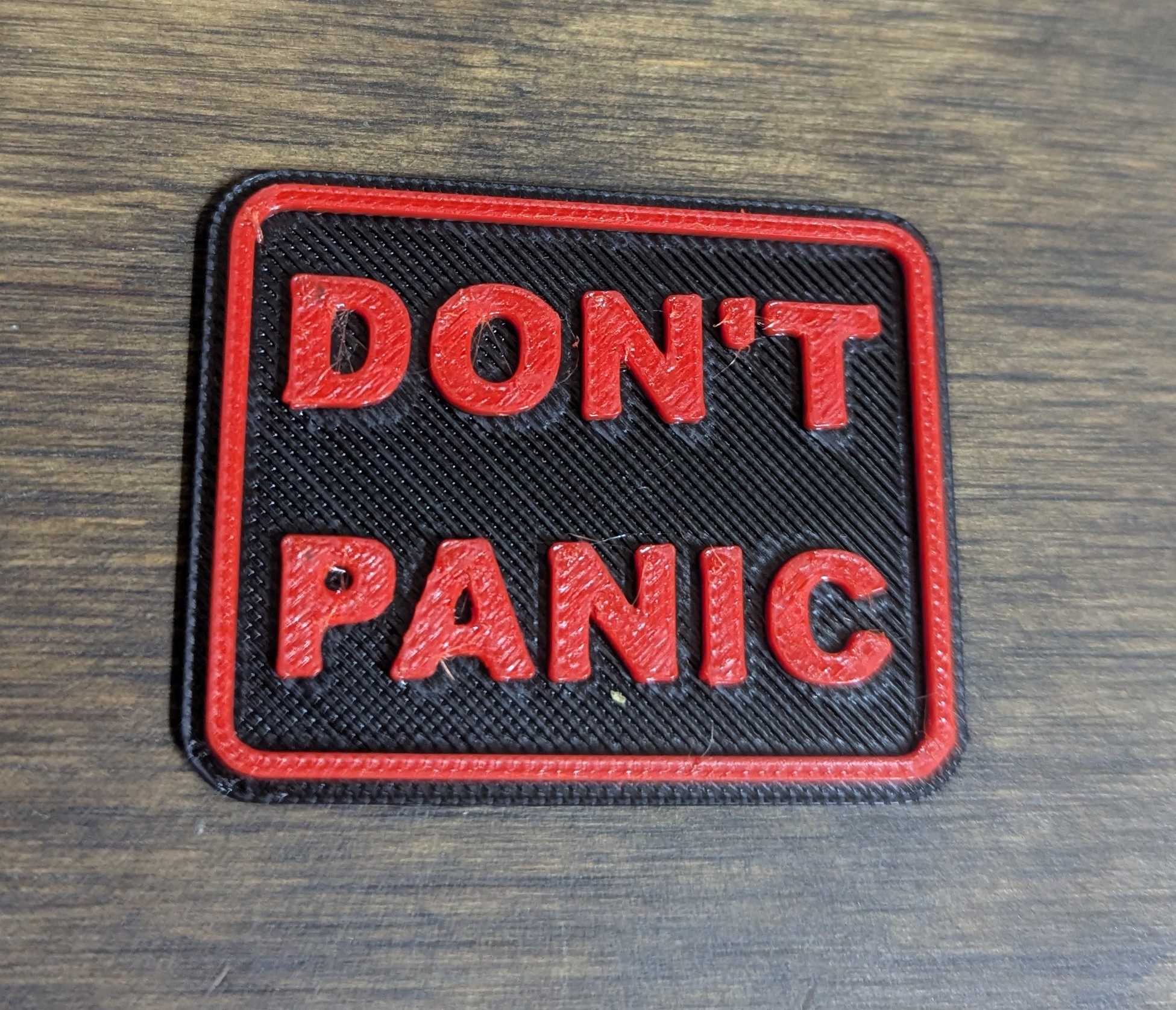 DON'T PANIC Badge