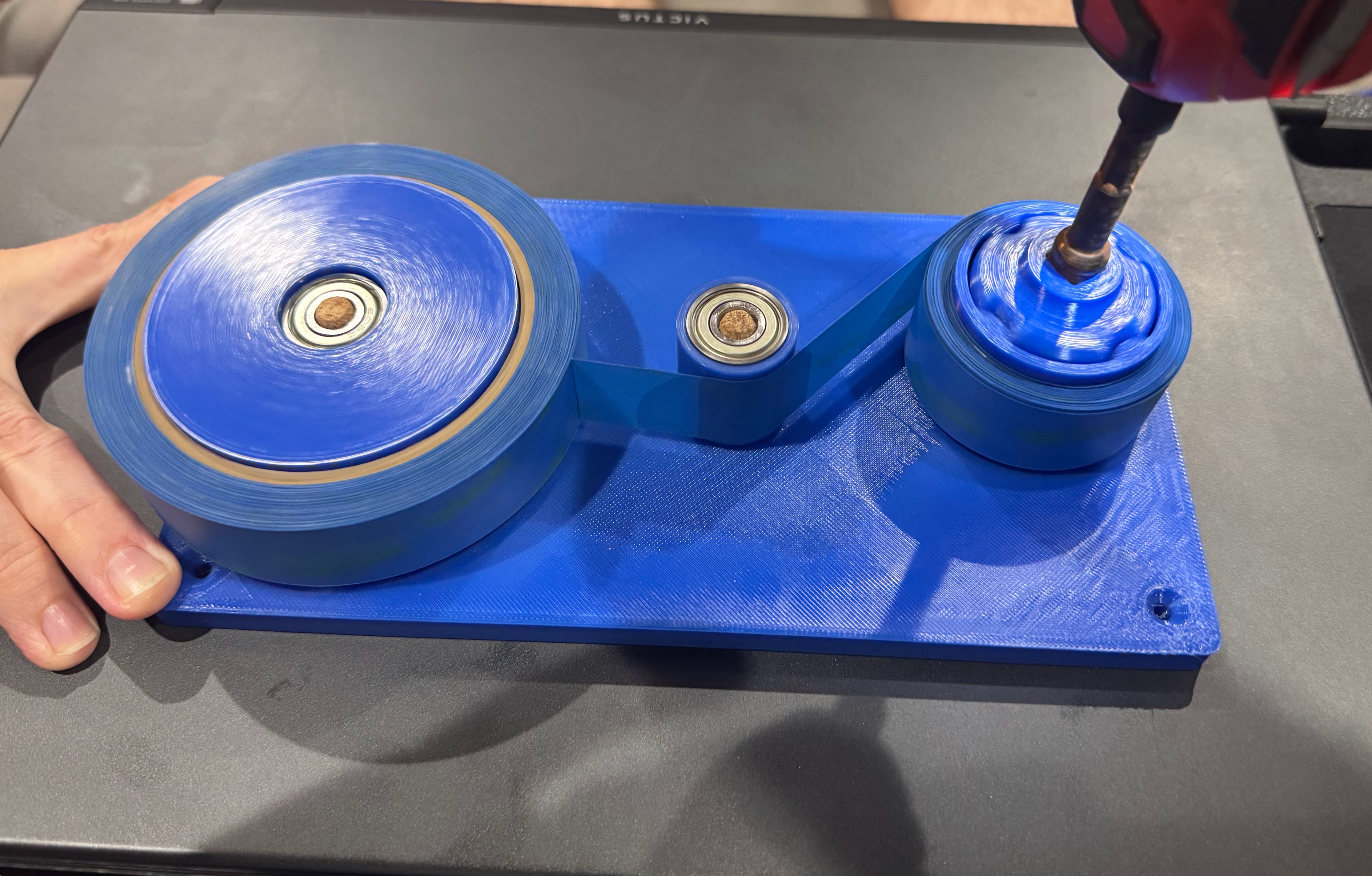 Spooler for 1 inch wide painter's tape rolls