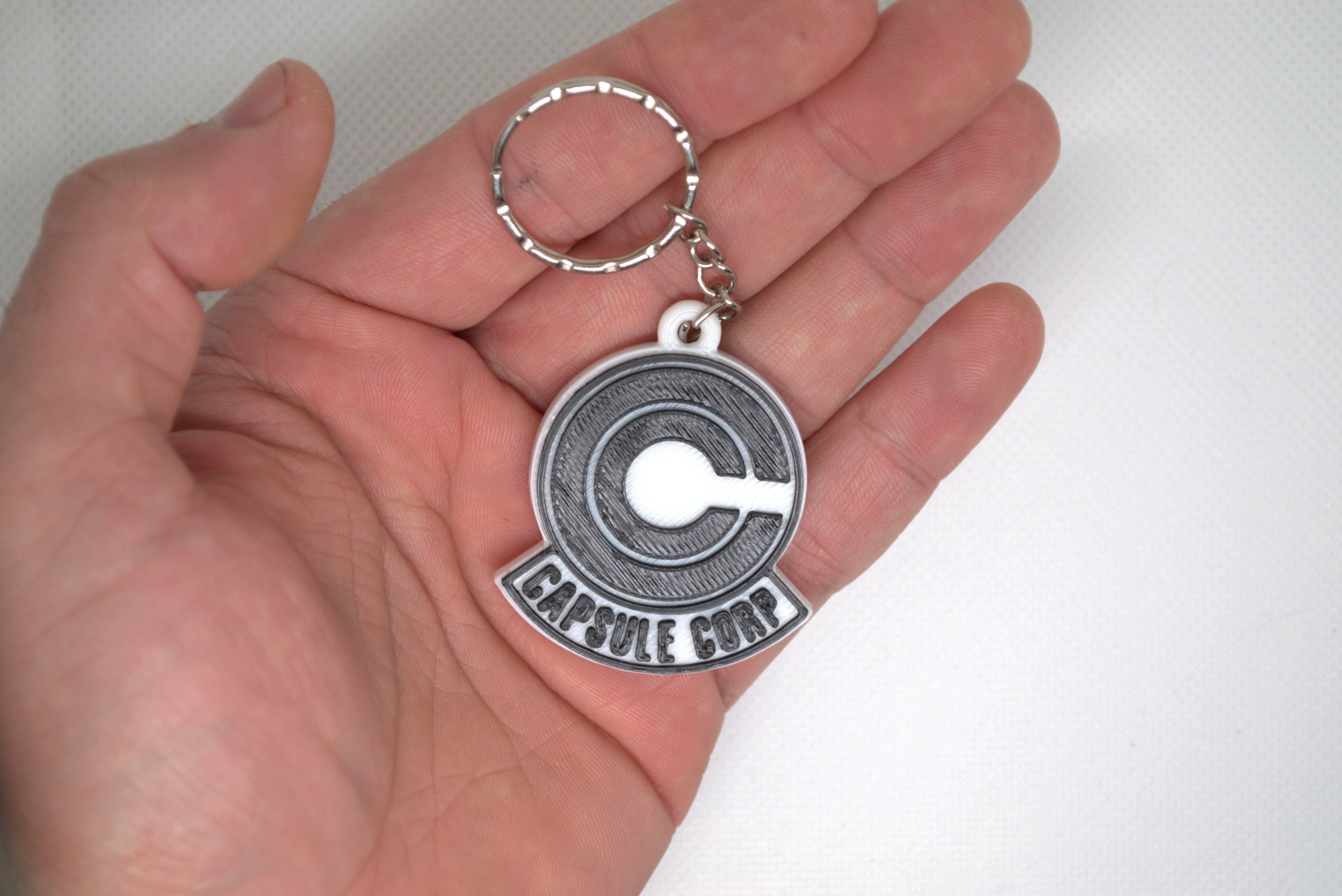 Dragonball Capsule Corp keychain
