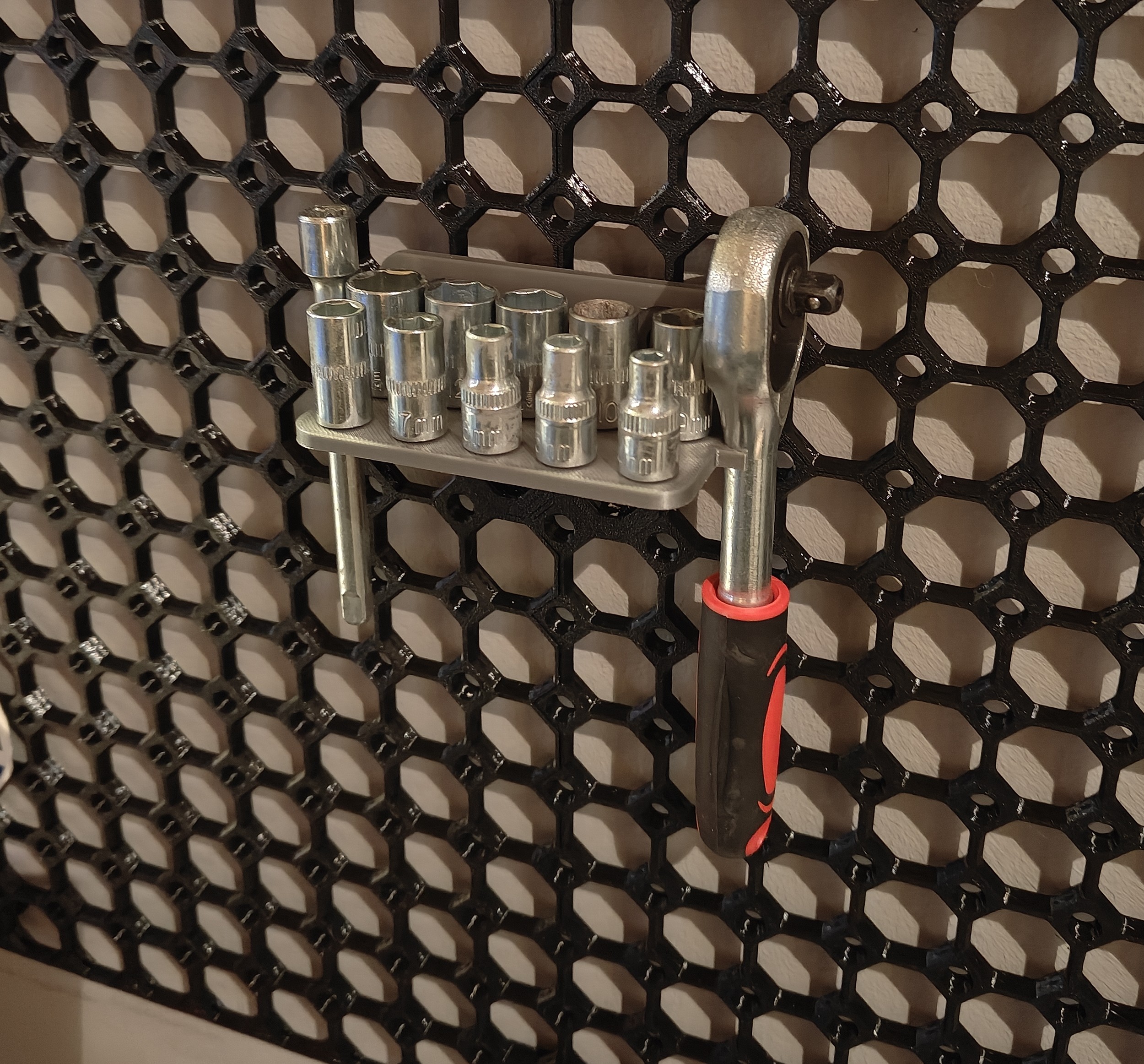 Socket wrench holder for multiboard.