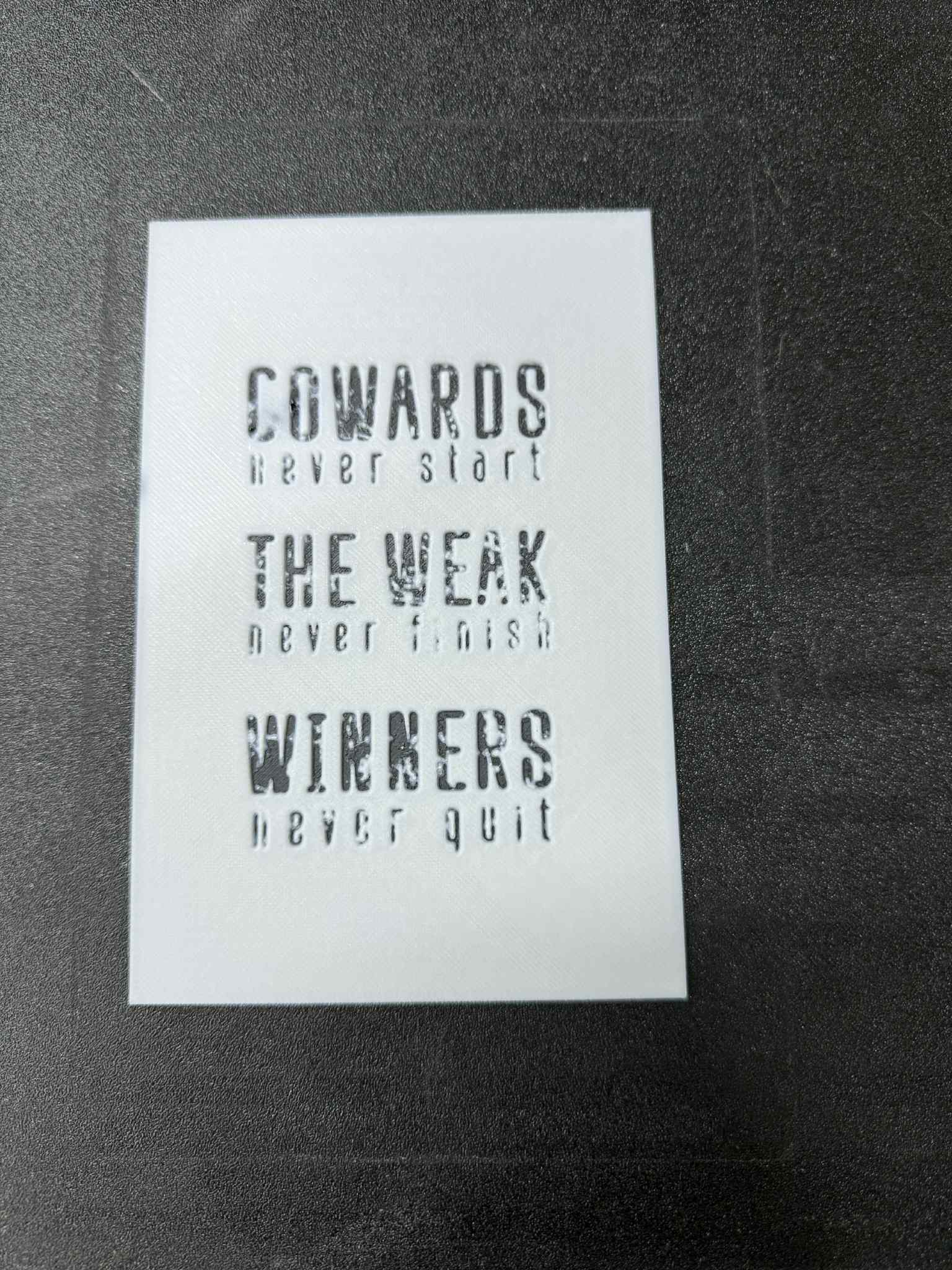 Winners never quit sign