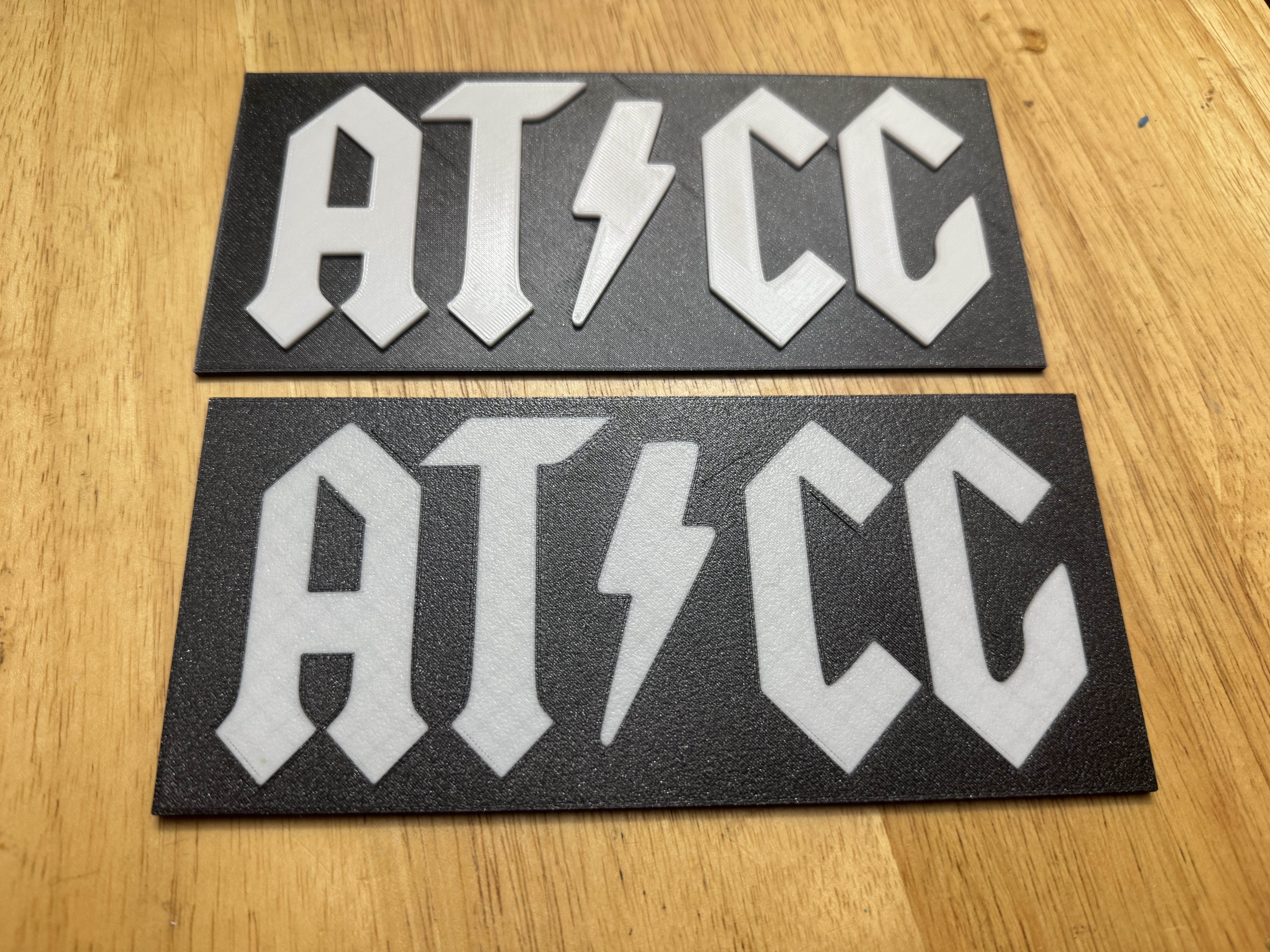 DNA nucleotide bases AT/CG in the band AC/DC logo design