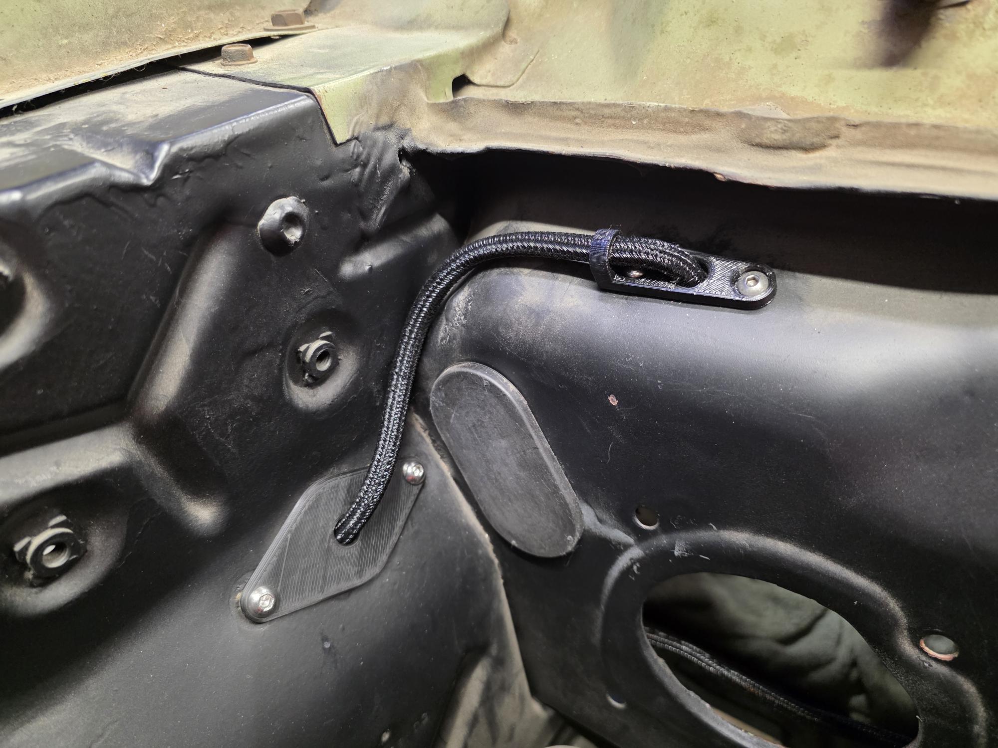 68 Mustang passenger side firewall wiring passthrough.
