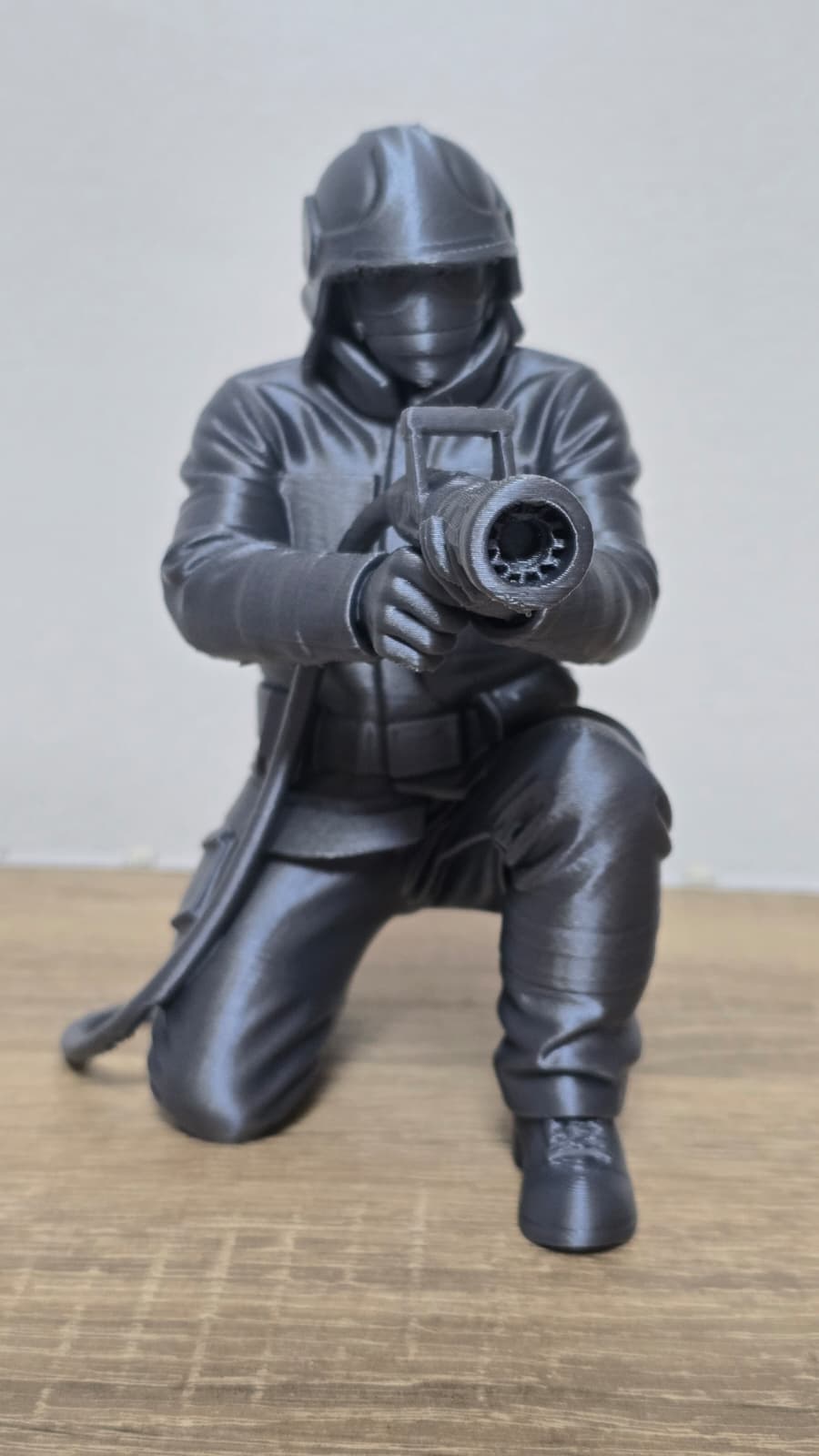 Firefighter Aiming Fire Hose