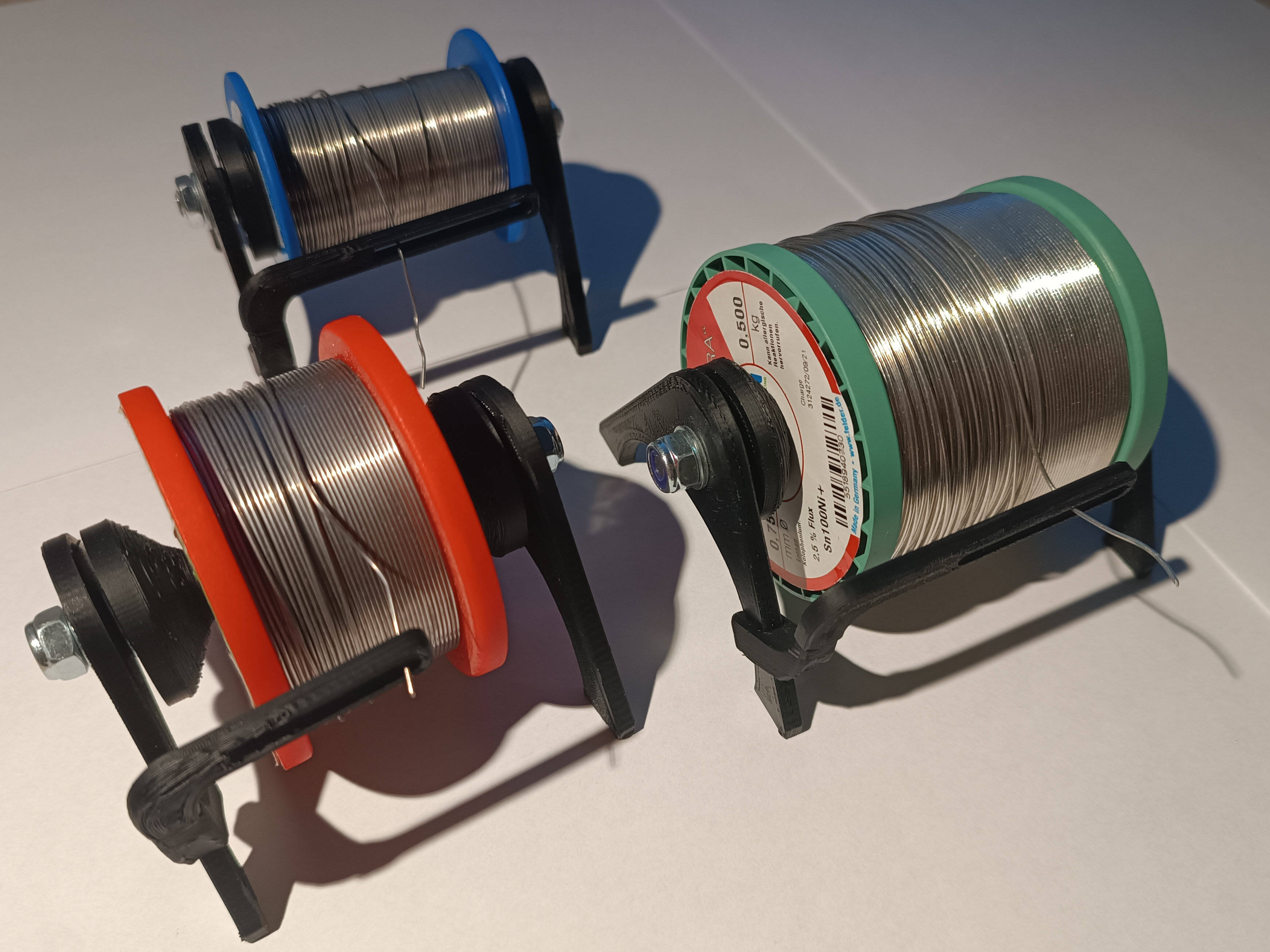 Universal soldering wire spool holder