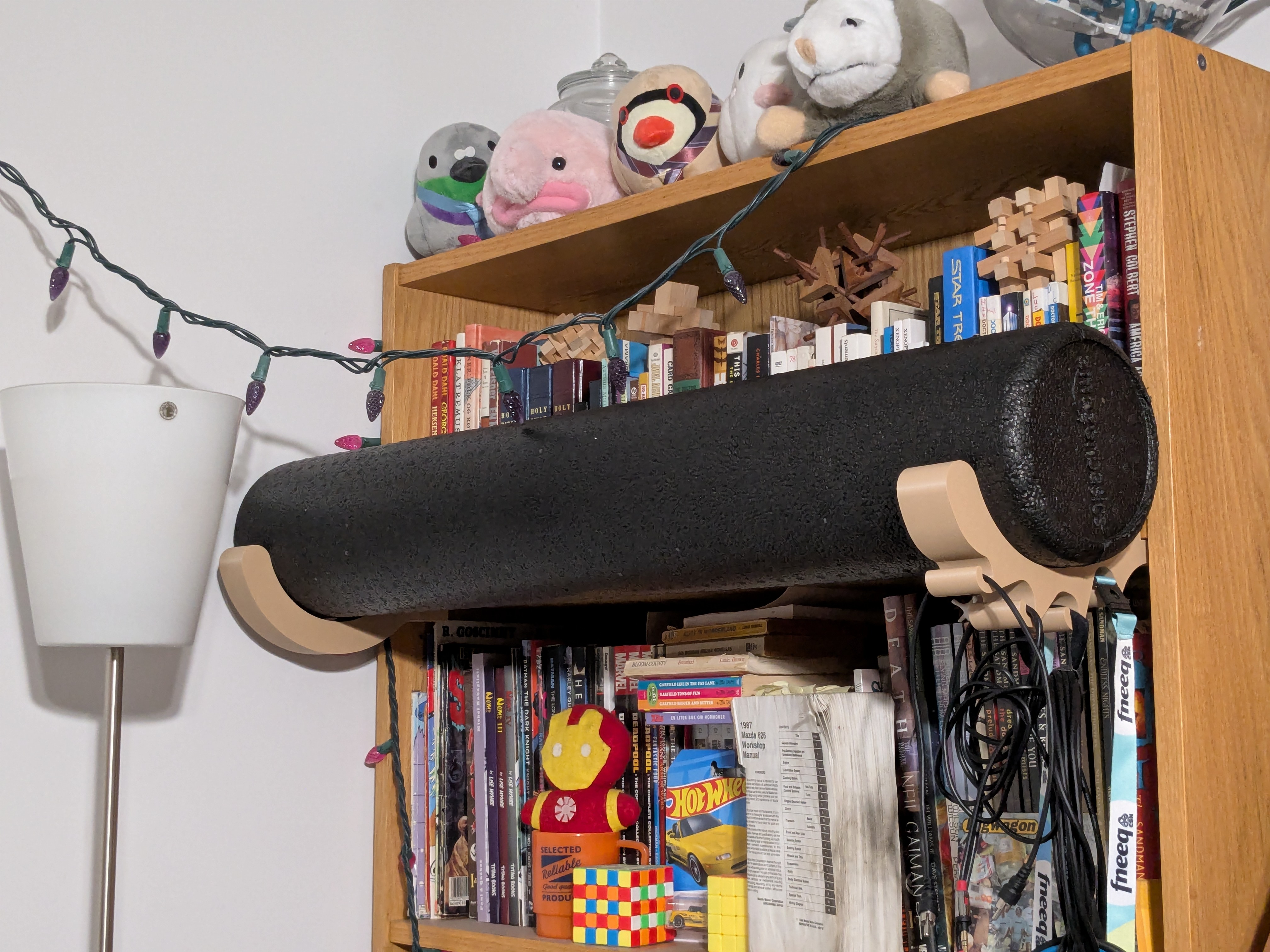 Foam roller holder for billy bookcase