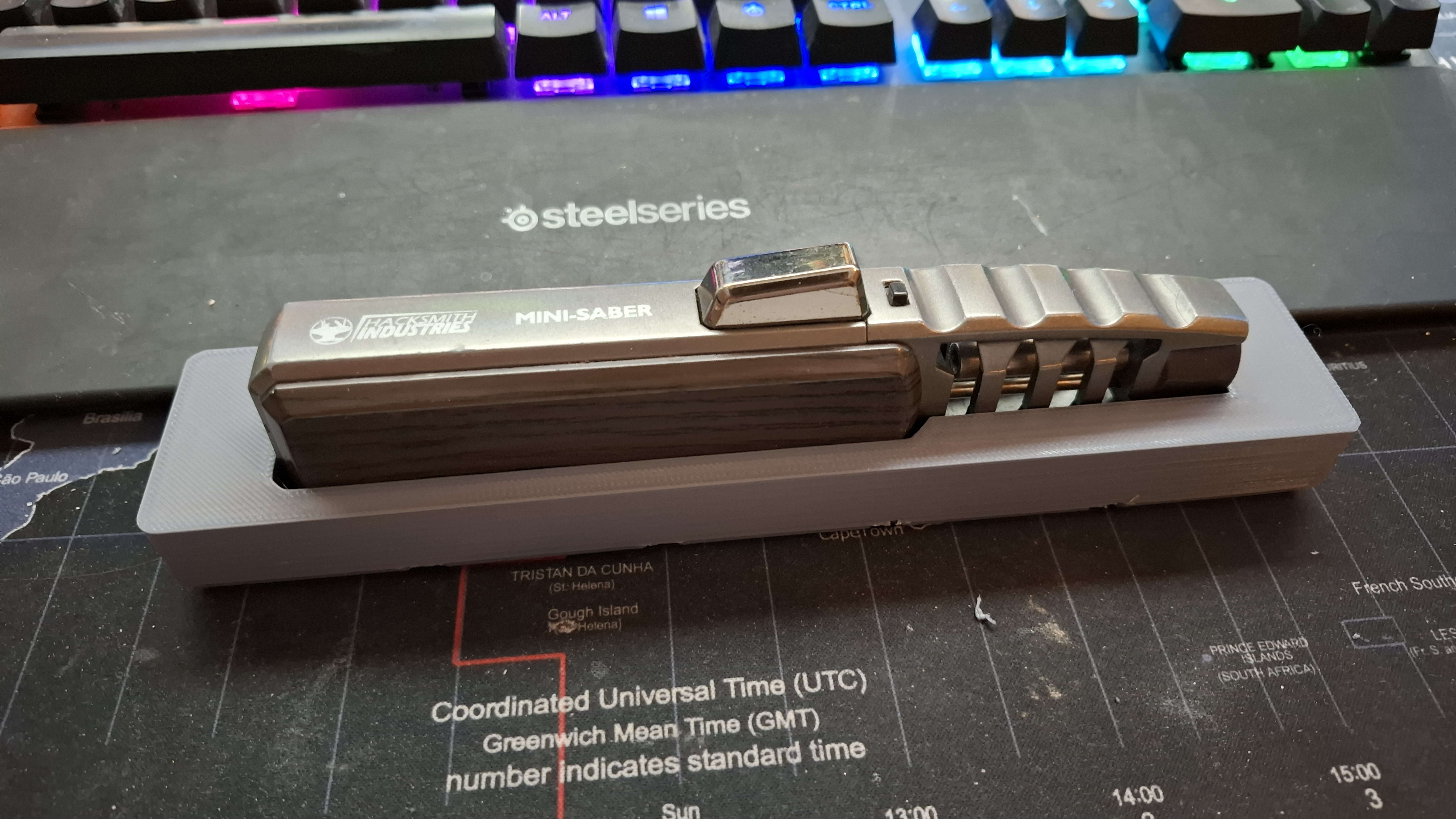A gridfinity hacksmith minisaber holder