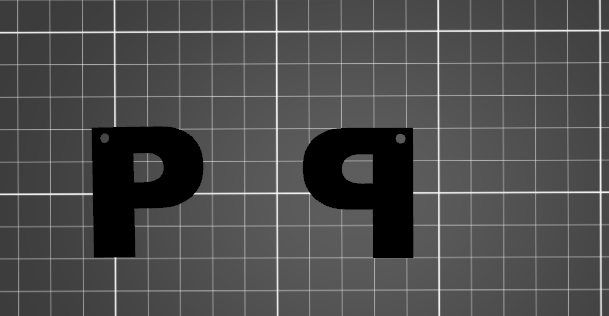 "P" keychain. mirror image