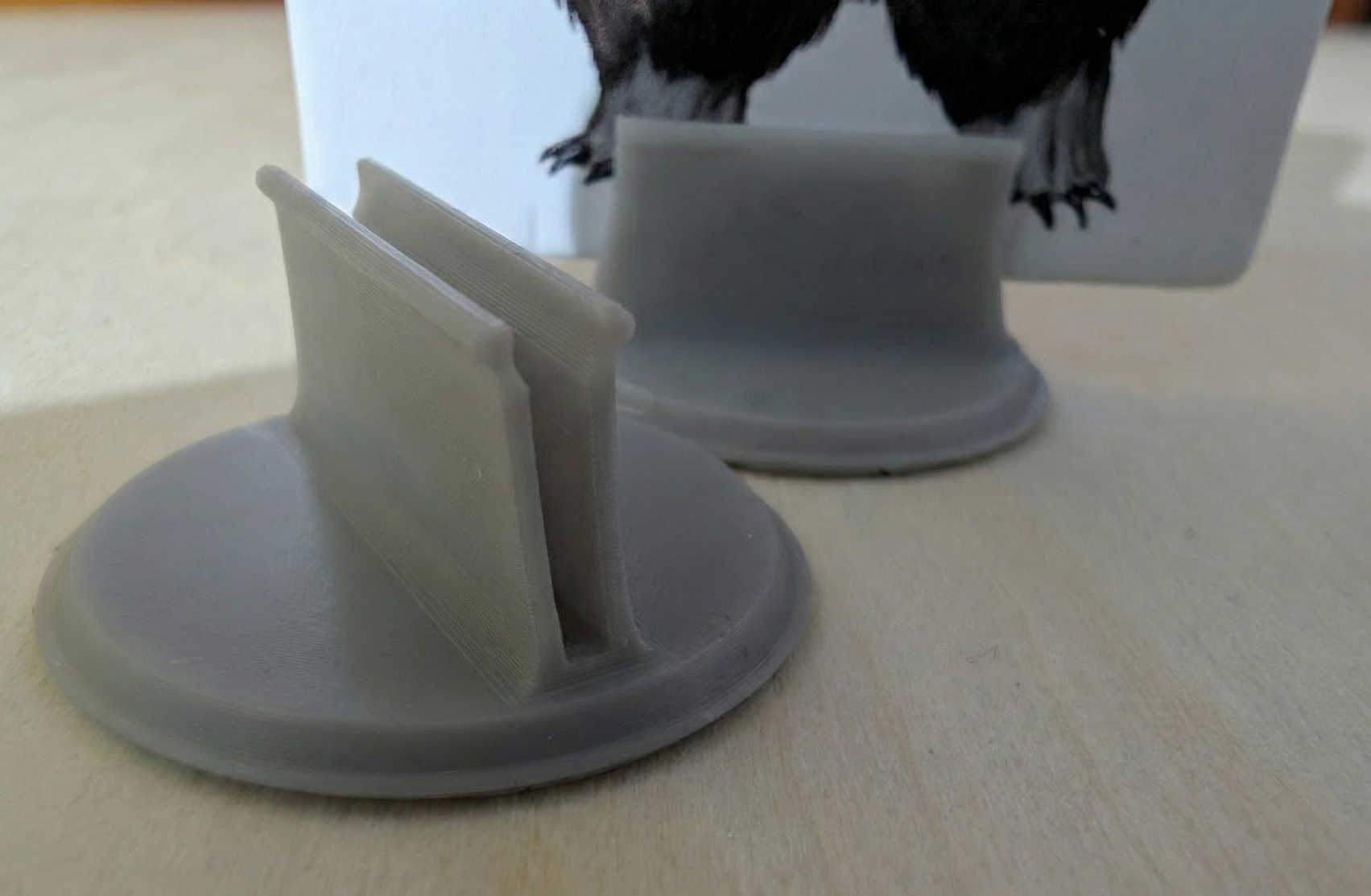 Engineered customizable standee holder base for game tokens