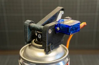 Motorized Spray Can Cap Trigger
