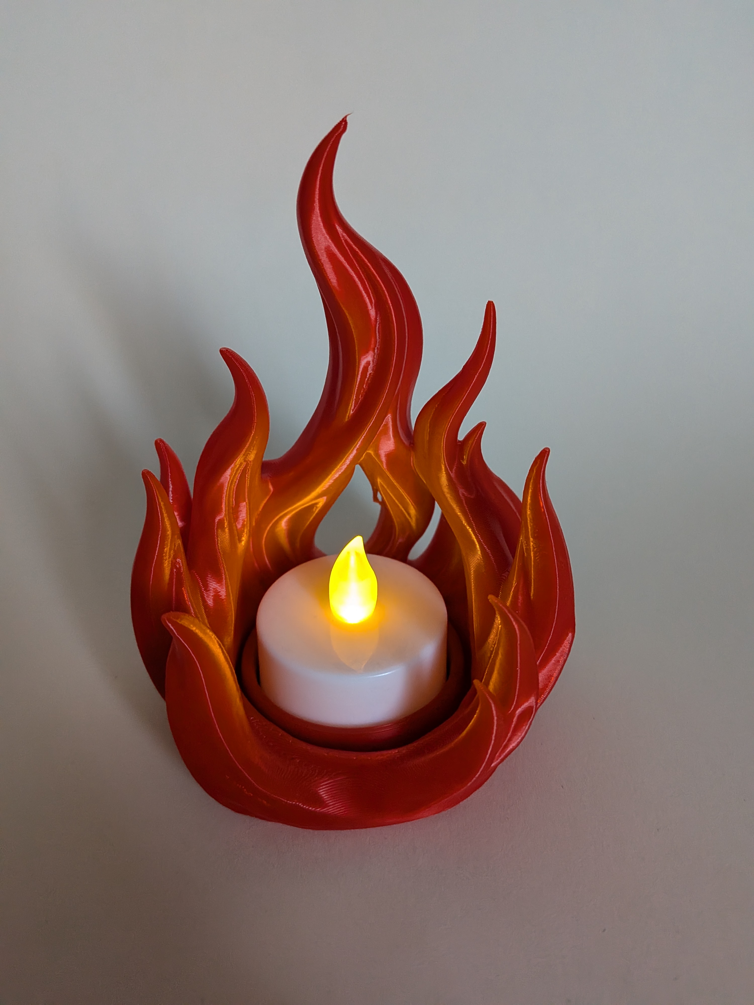 Flaming LED tealight holder