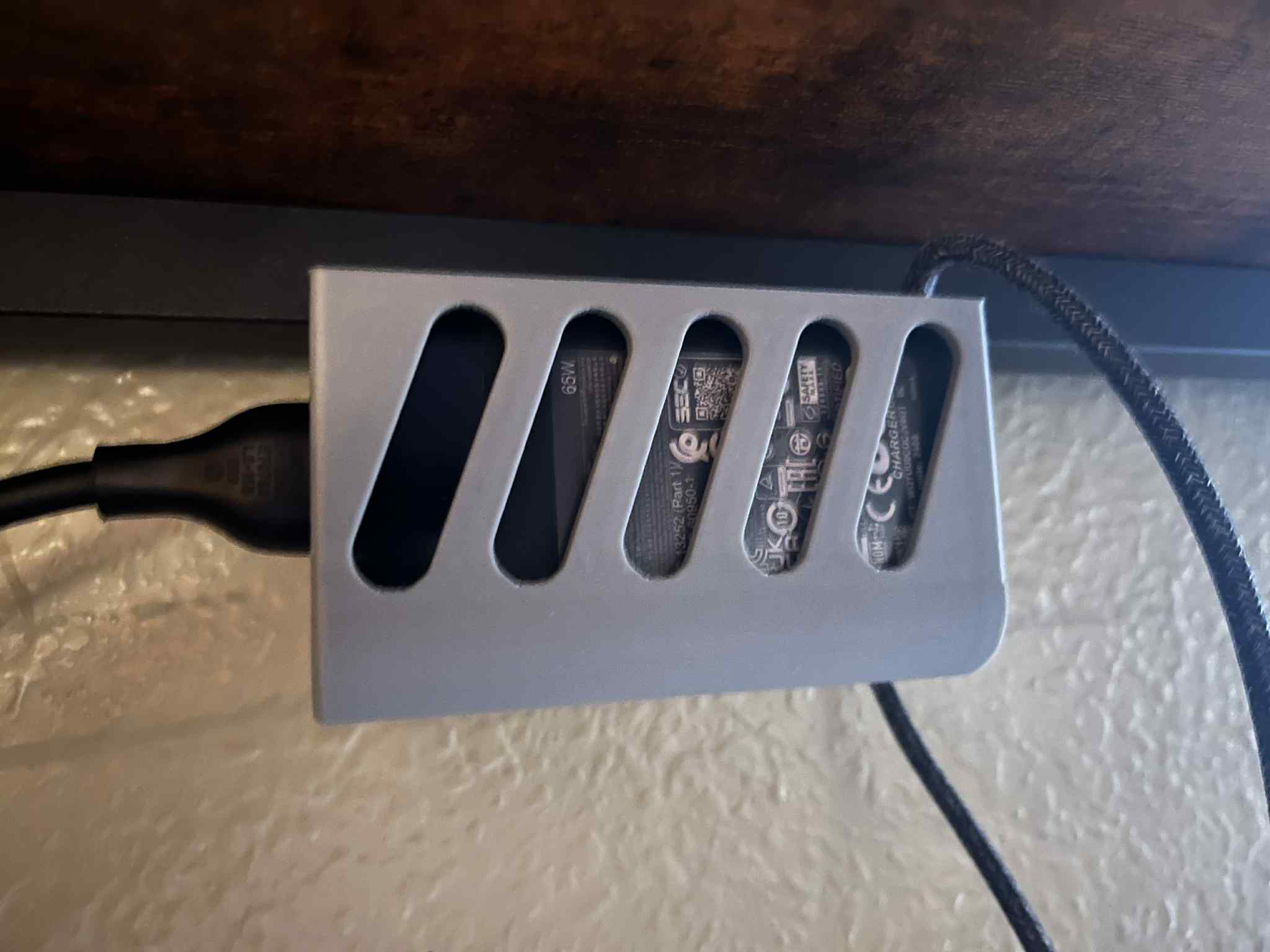 Laptop charger holder