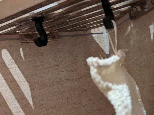 Hook for mounting under Hansgrohe AddStoris Q Corner basket