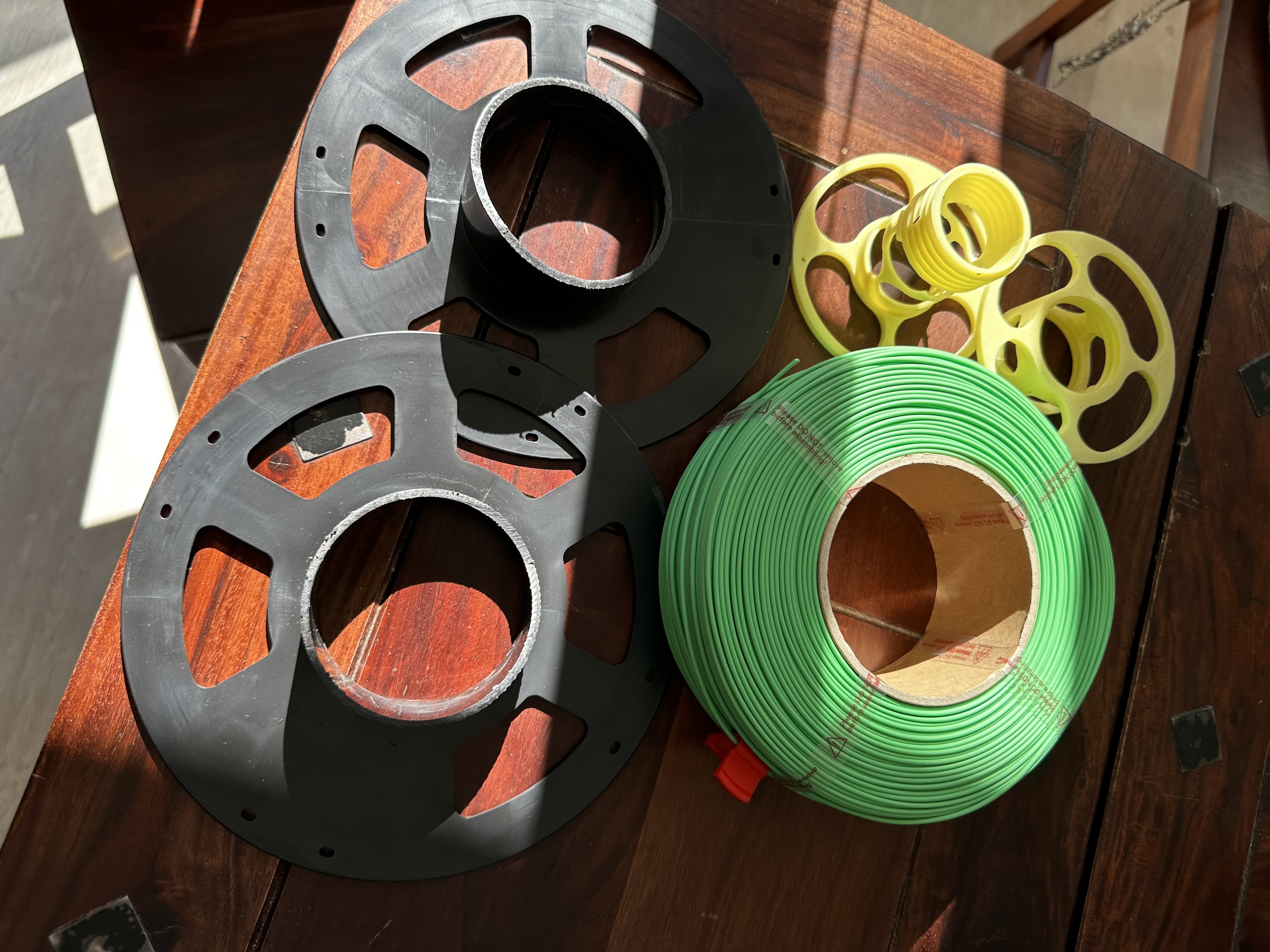 Universal refill filament spool adapter