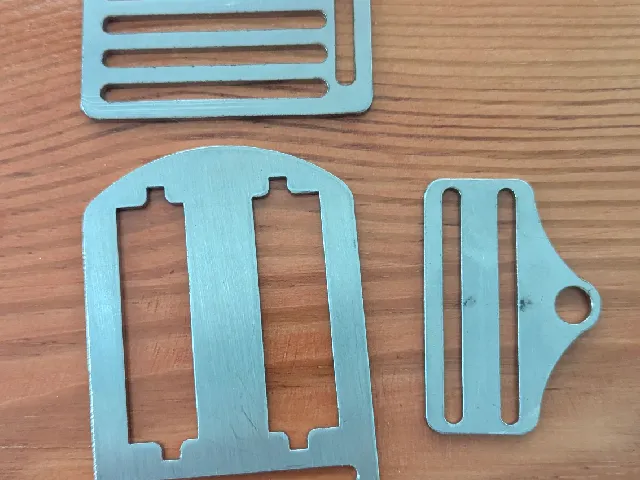 Scuba harness buckles