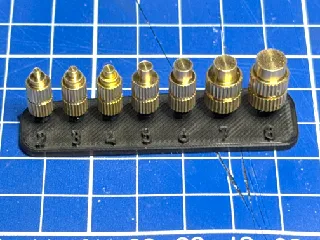 Threaded nut insert tool holder