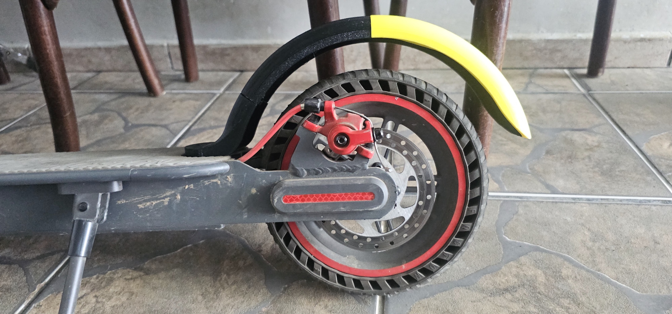 Electric scooter mudguard