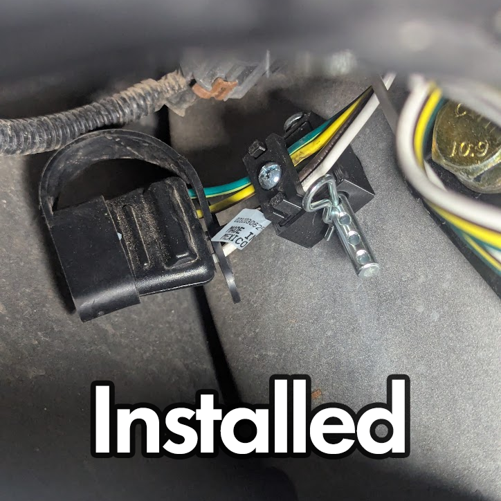 Nissan Xterra 4-way flat tow connector wire stowage (toolless usage)
