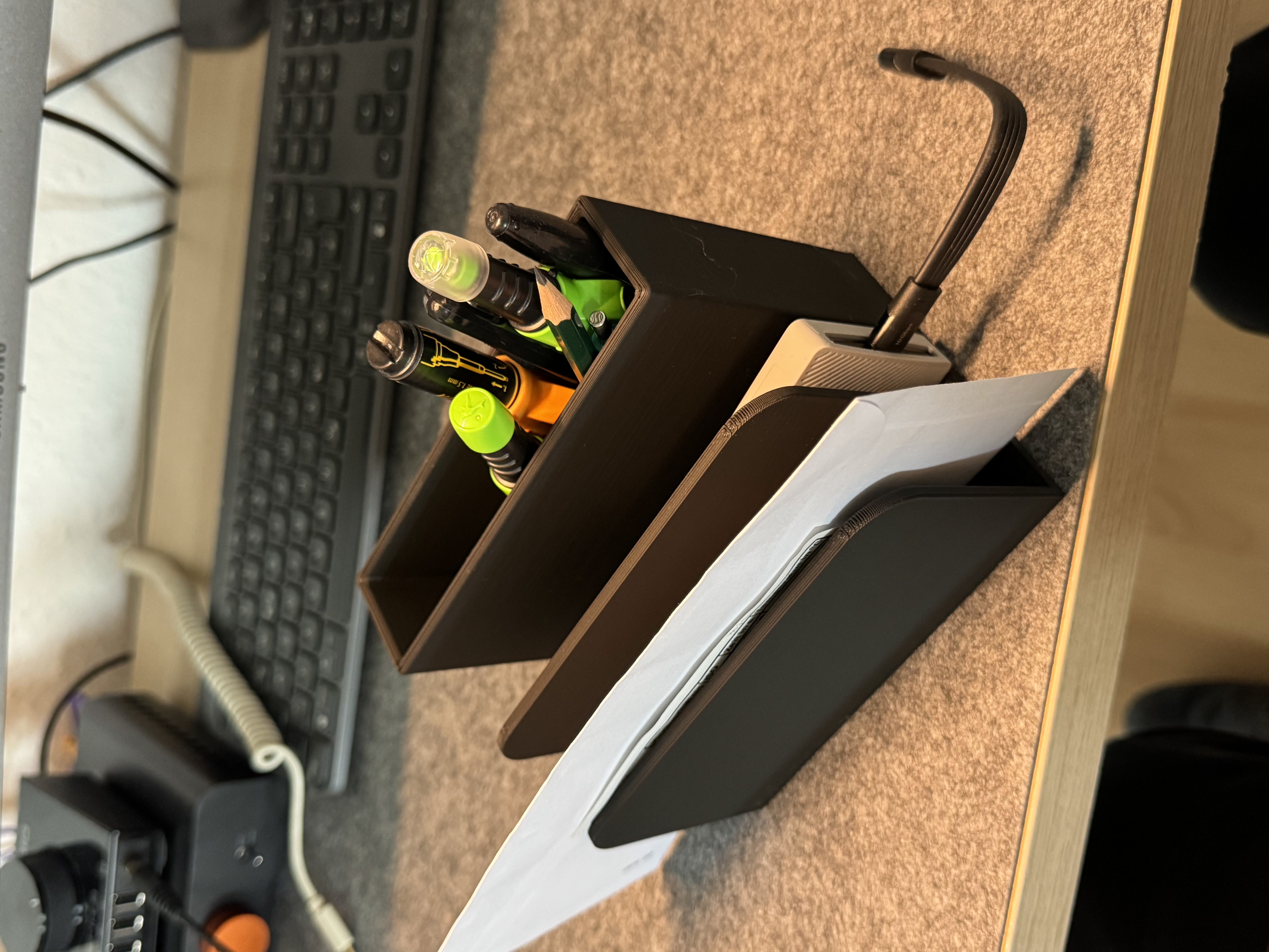 Document holder with an integrated pen holder