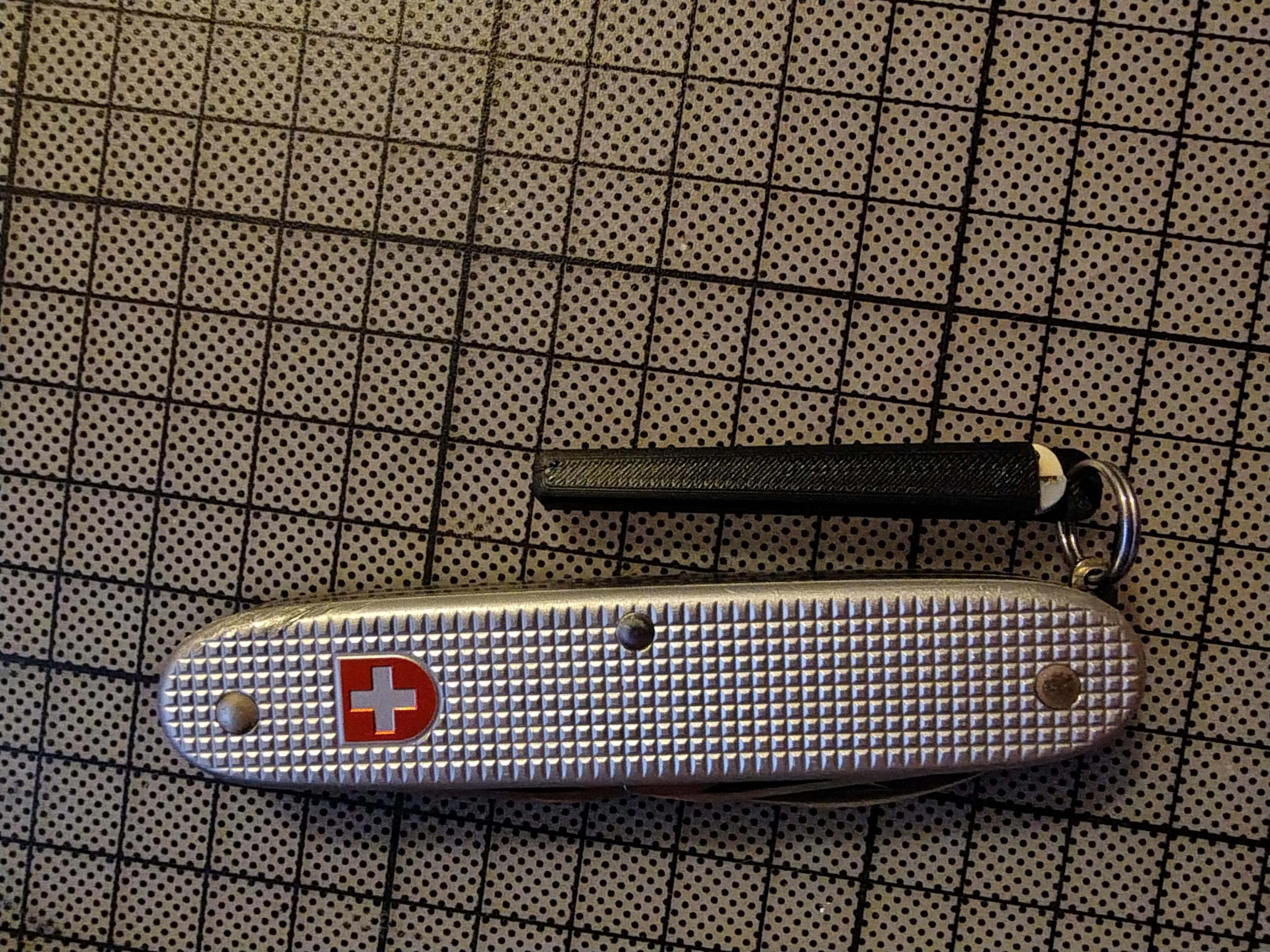 Victorinox tweezers, toothpick & needle holder