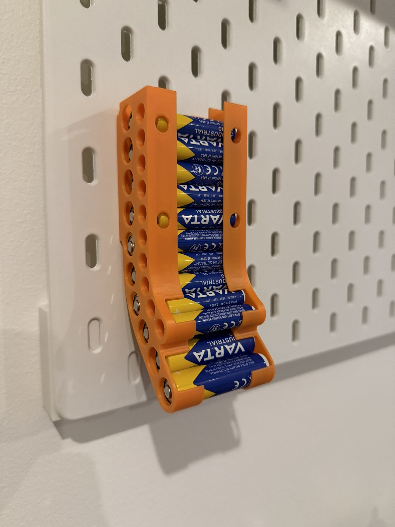 Skadis Battery Holder, with bigger pegs for more stability.