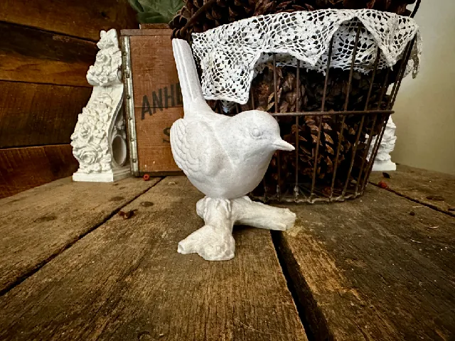 Weathered Bird Statue
