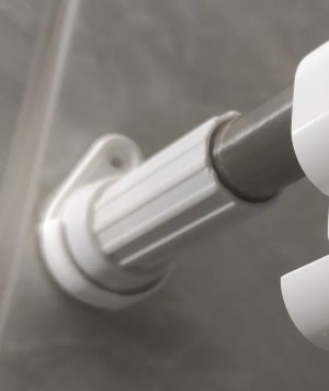 Shower curtain rod fixation