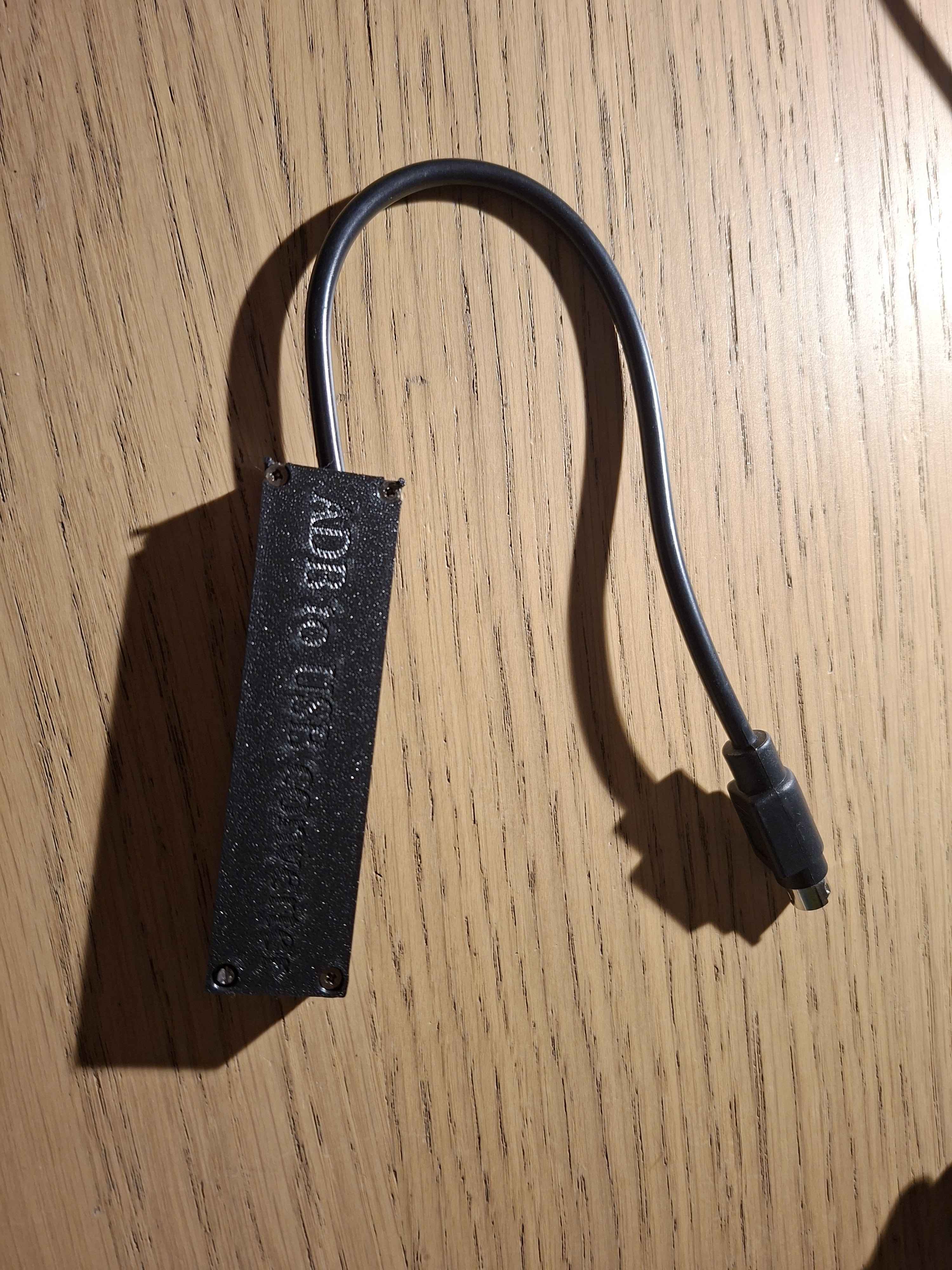 Apple Desktop Bus ADB to USB converter casing with raspberry pi pico