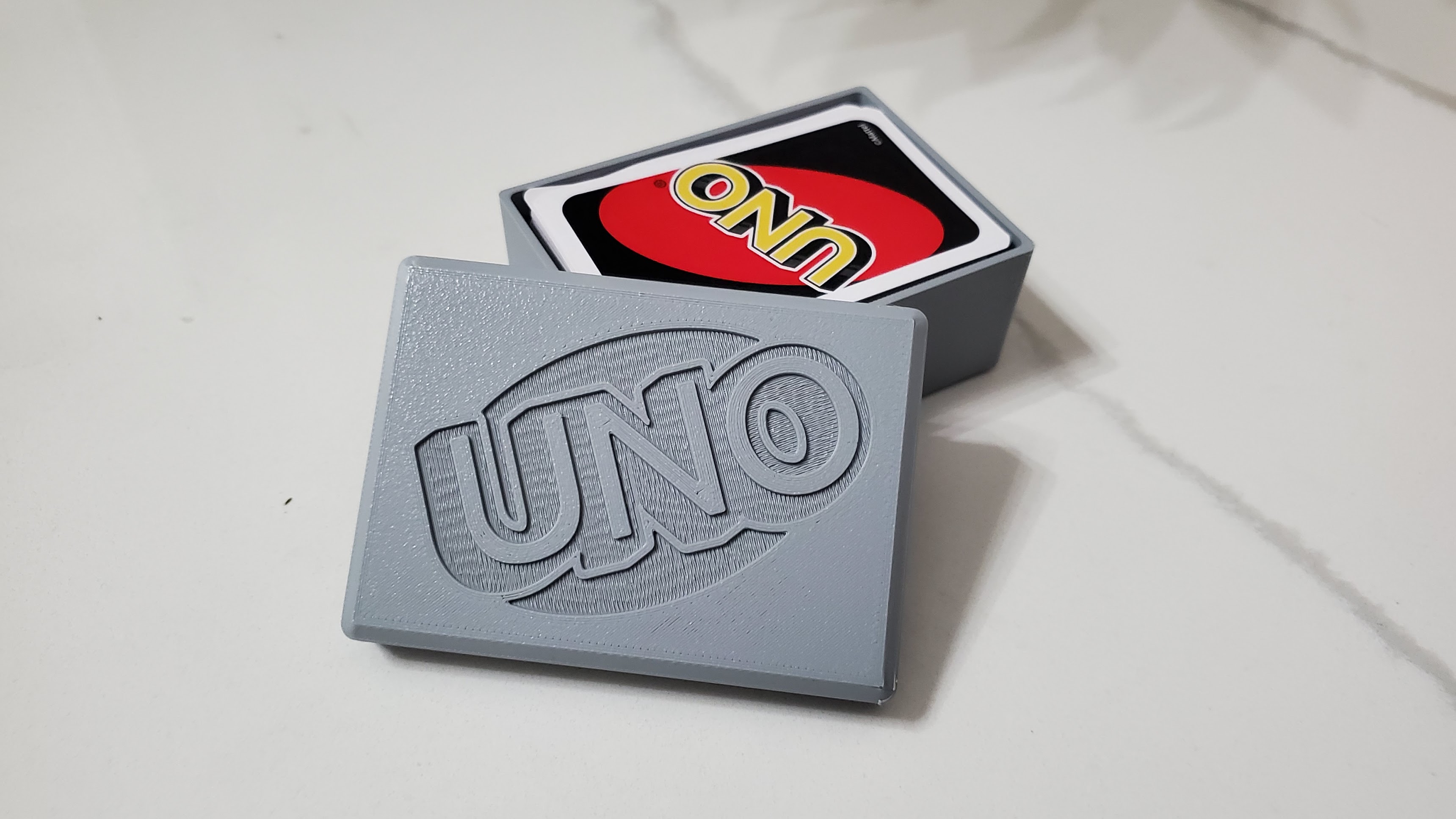 Uno card box with logo