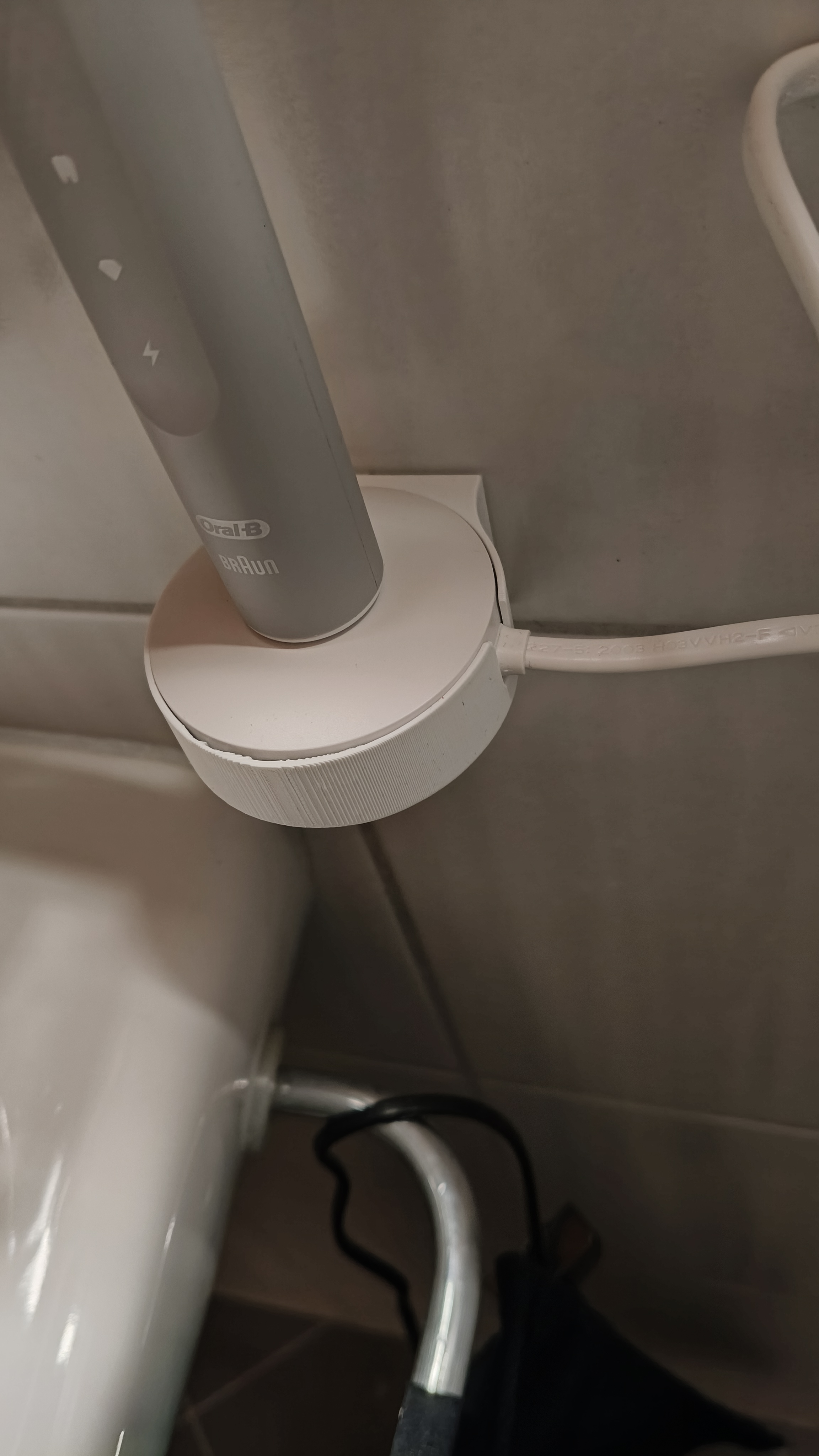 Wall mount for the Oral-B Pulsonic toothbrush charger