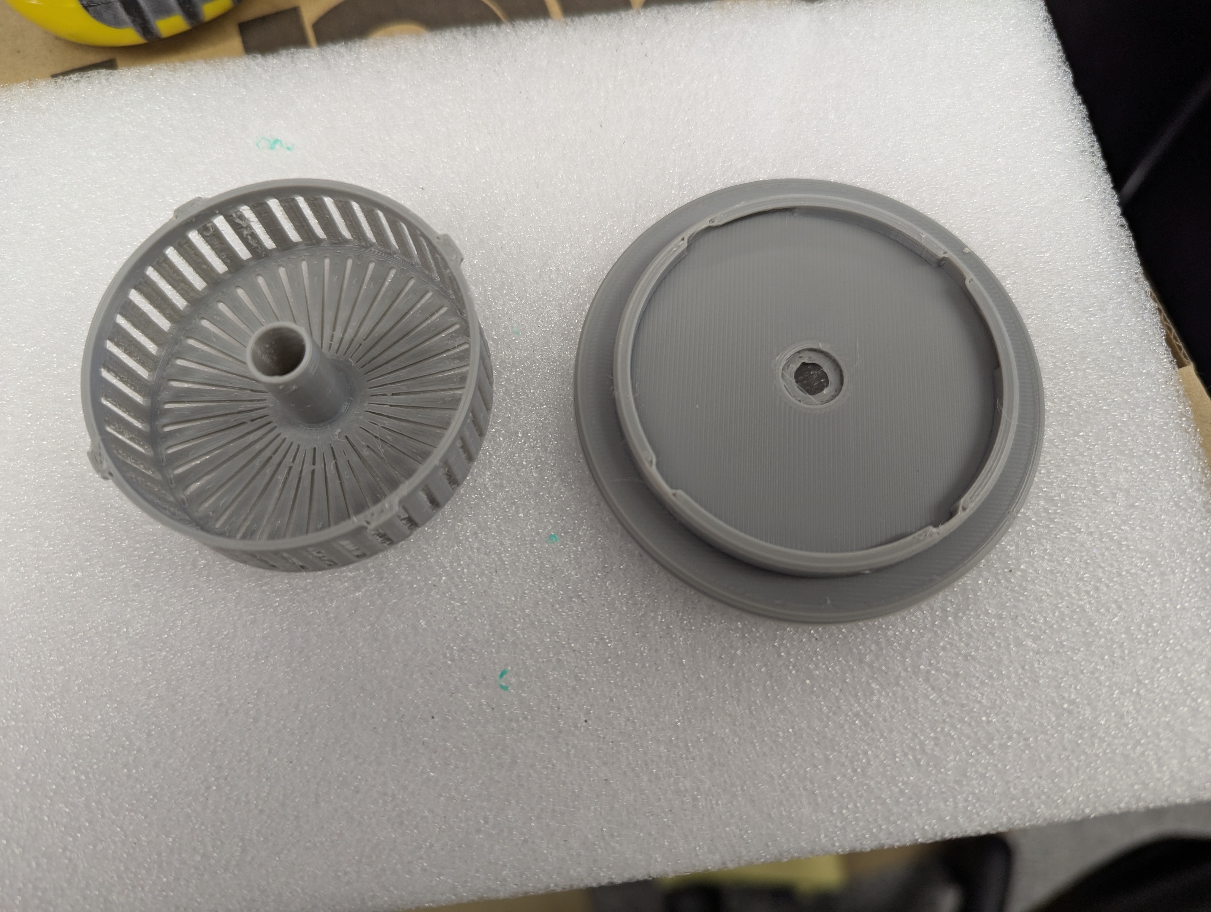 Bottom feed desiccant holder for cereal box drybox
