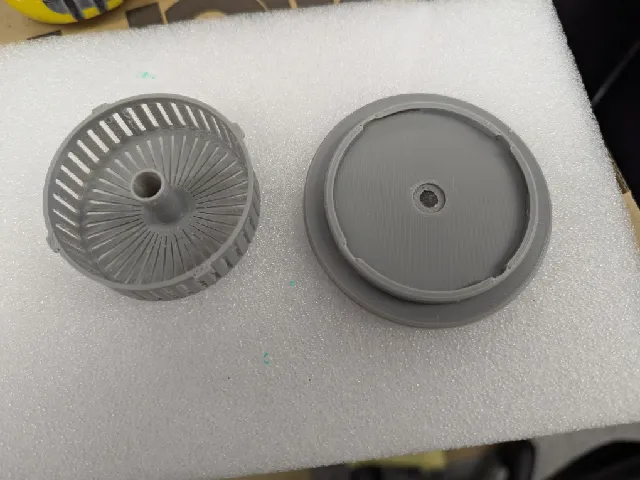 Bottom feed desiccant holder for cereal box drybox