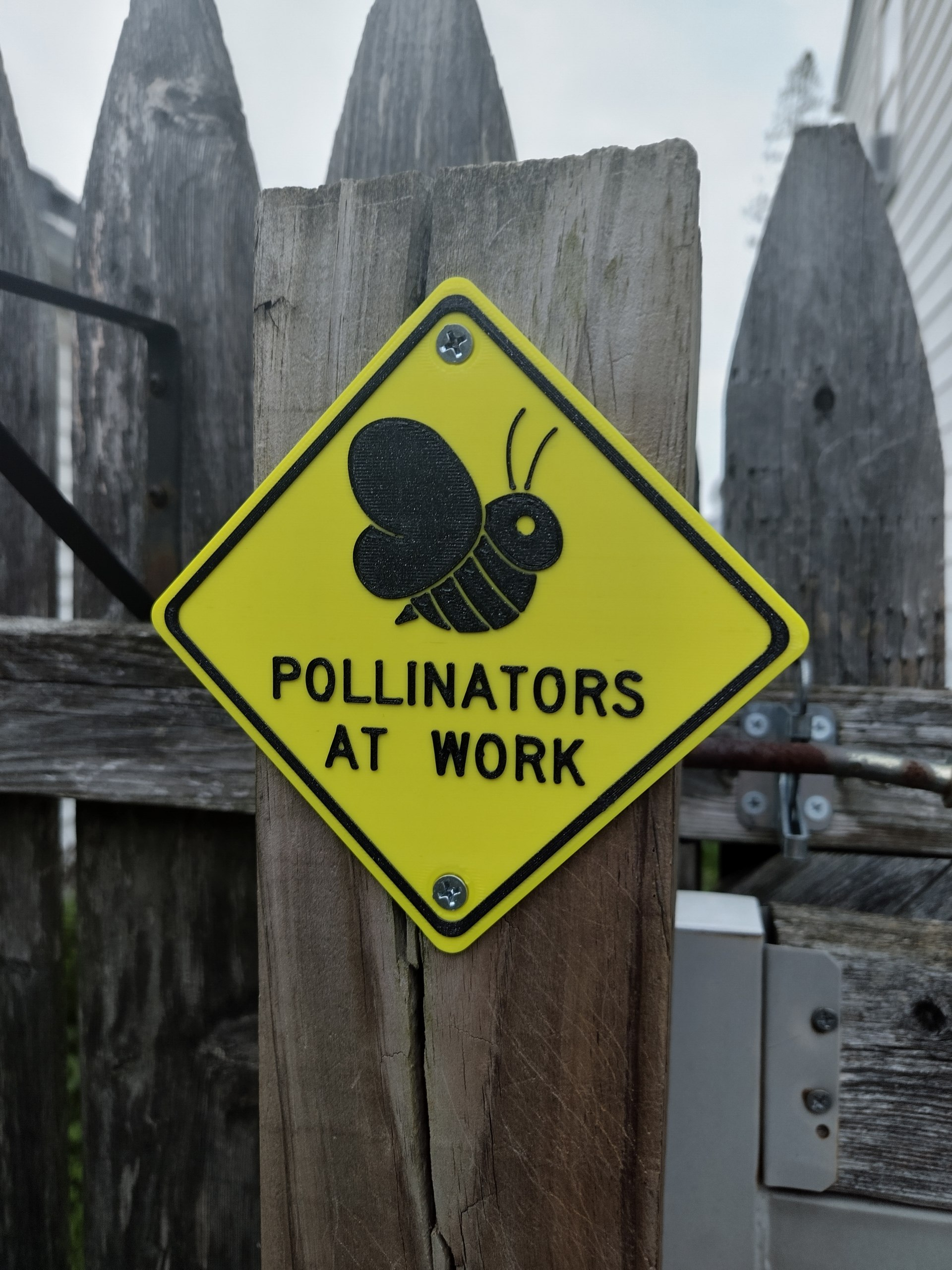 "Pollinators at Work" sign
