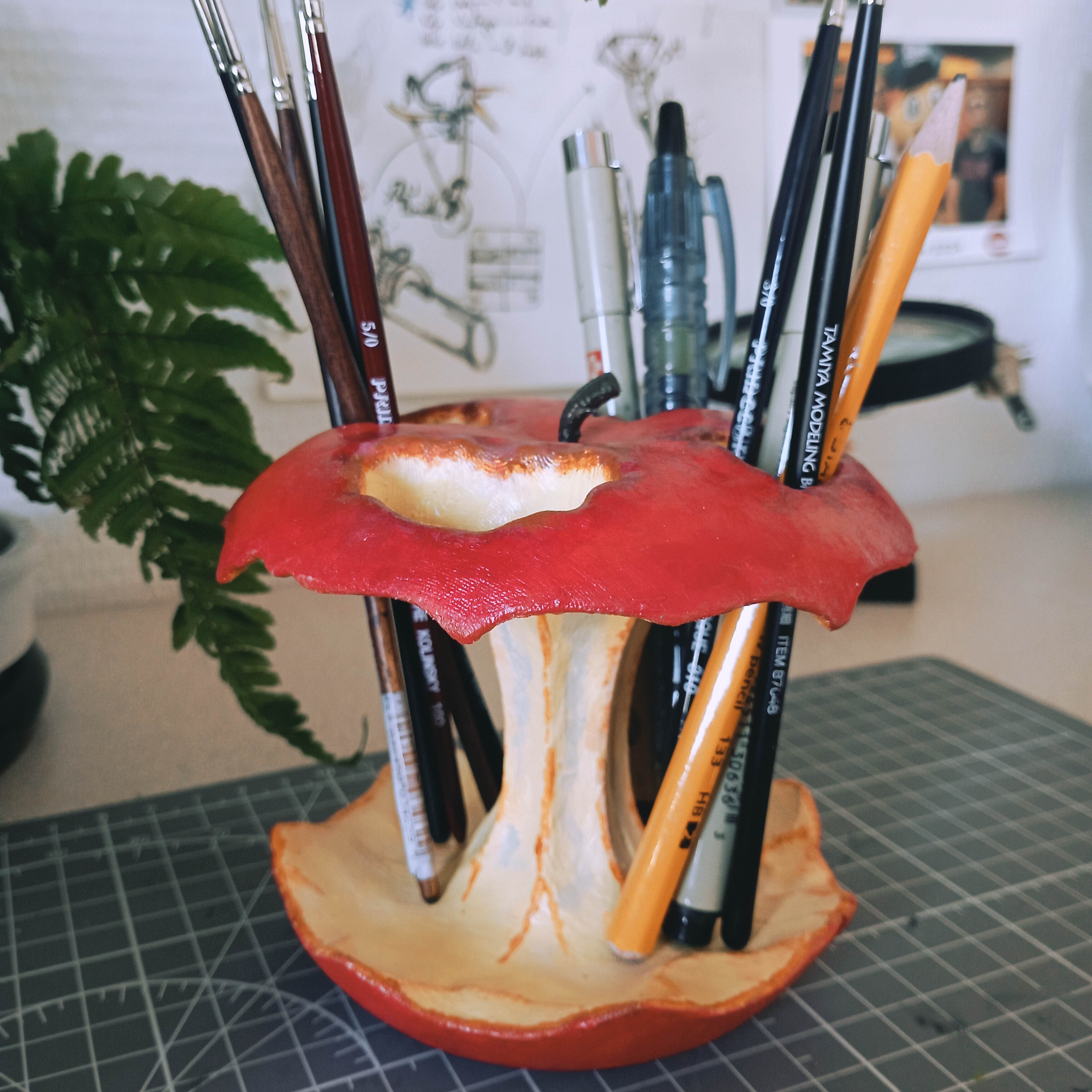 Rotten apple pencil holder