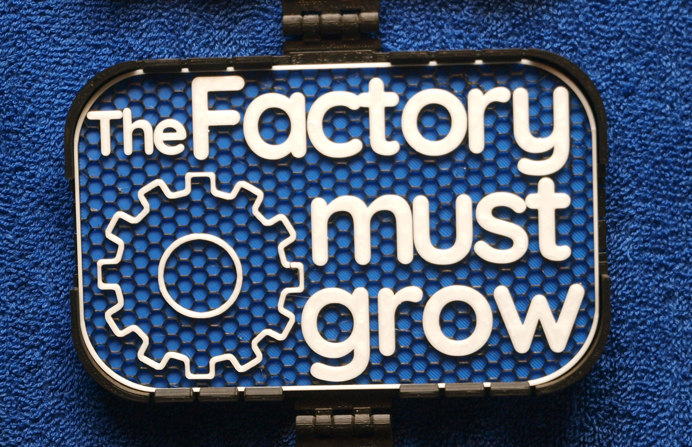 The Factory must Grow sign