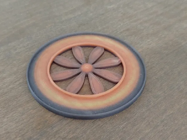Coaster for hot drinks