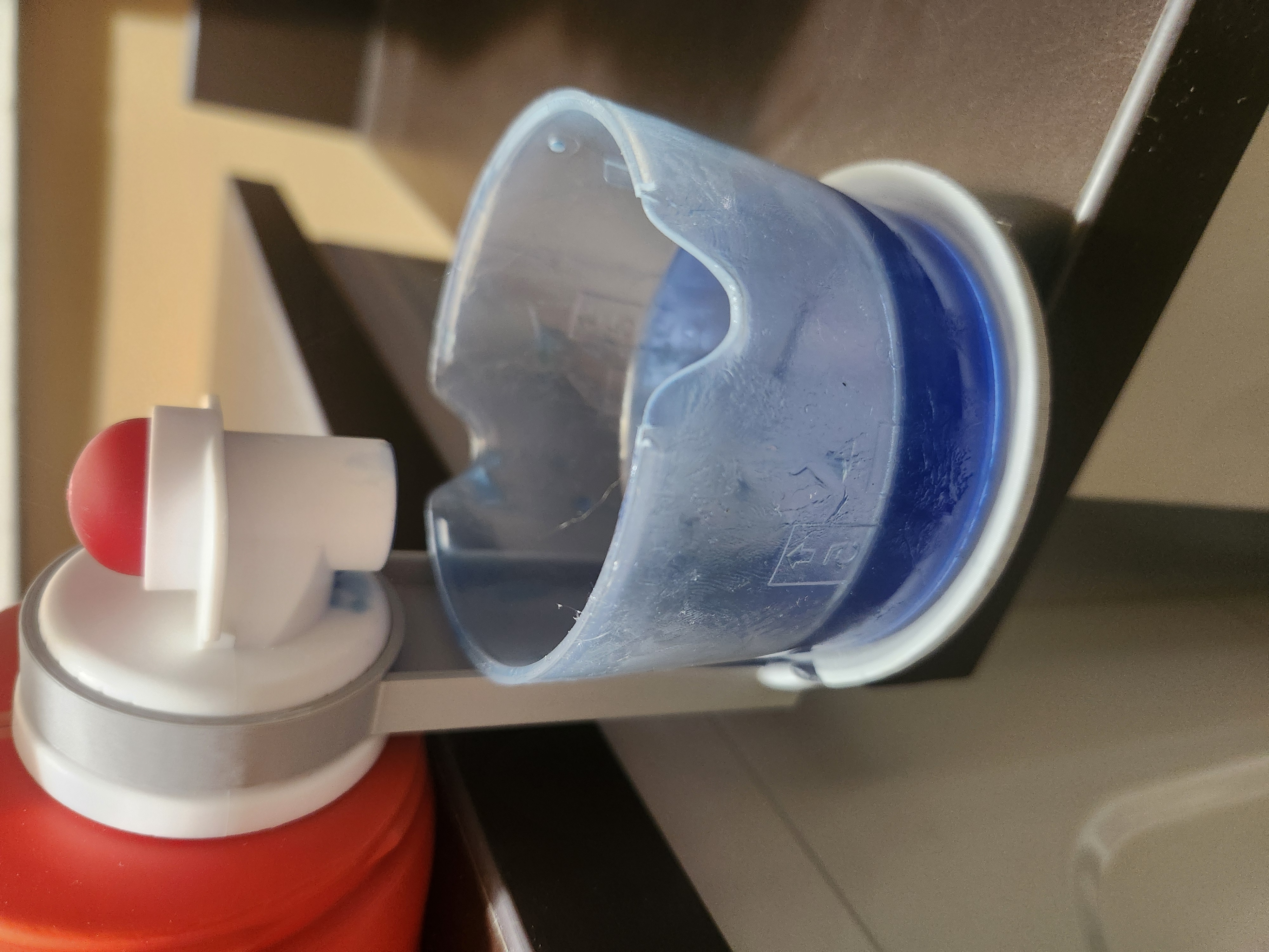 Laundry detergent cup holder- fits Tide and Gain Jugs
