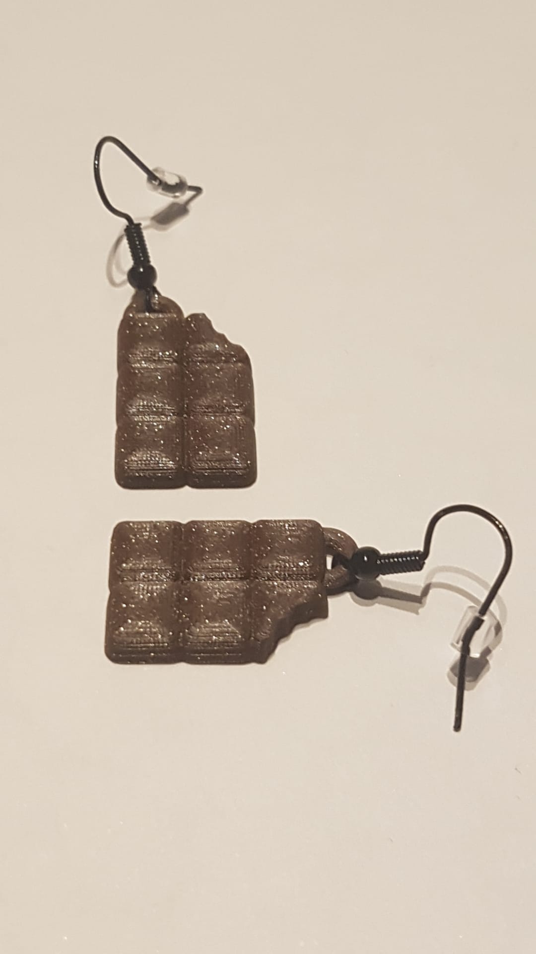 Chocolate earrings with a bite