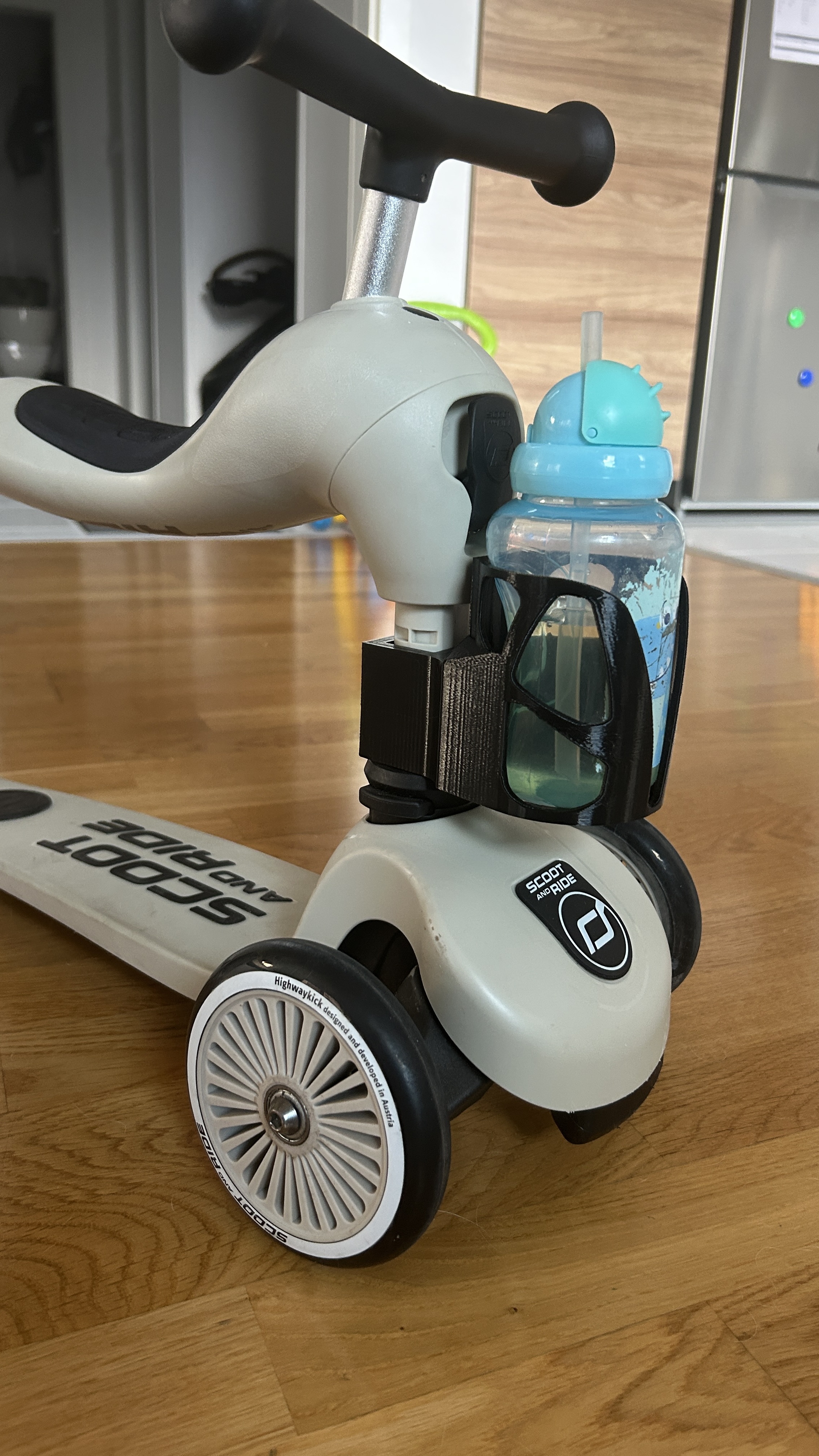 Scoot and ride kid's bottle holder
