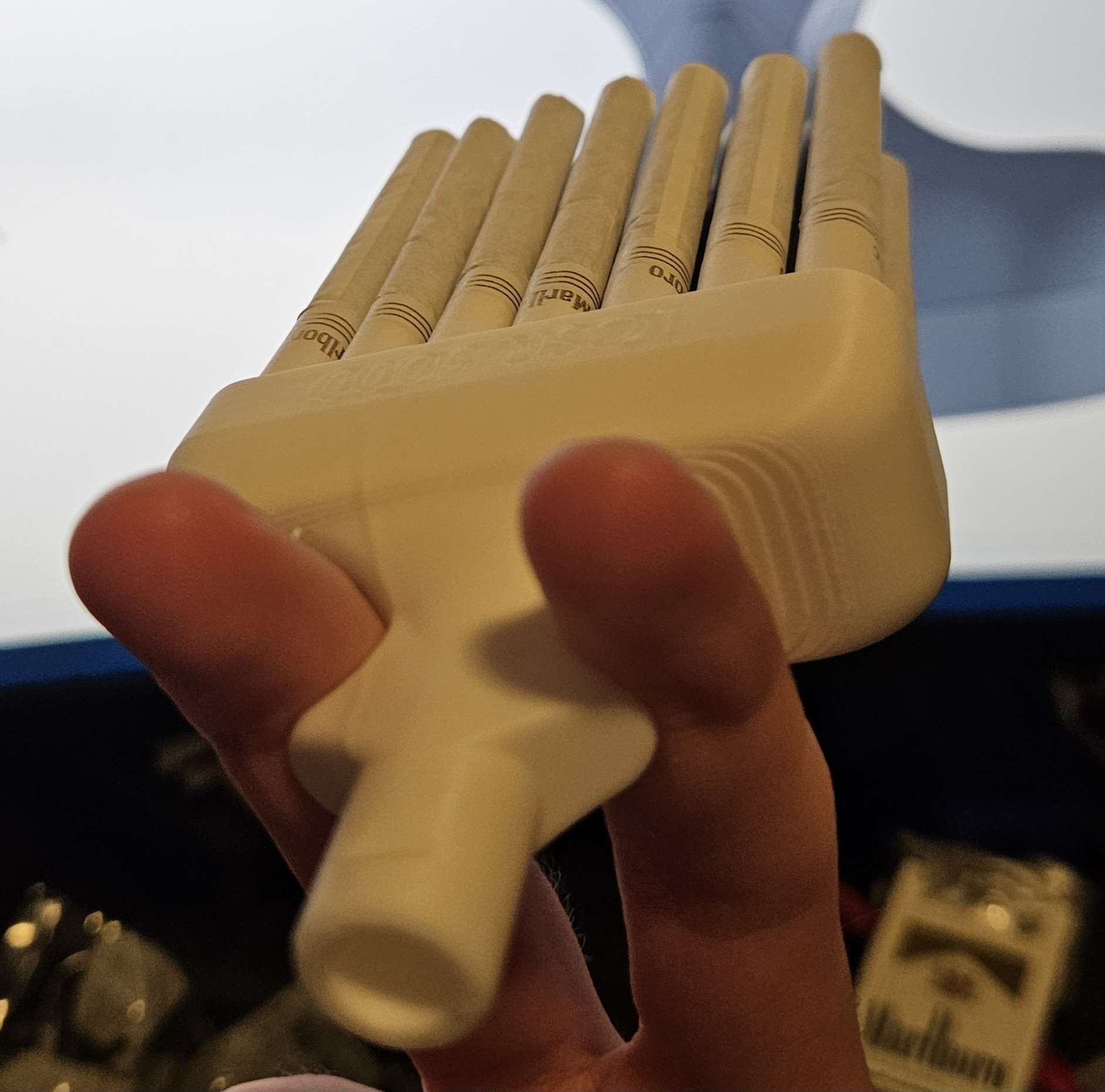 Ergonomic Cigarette Pack Adapter