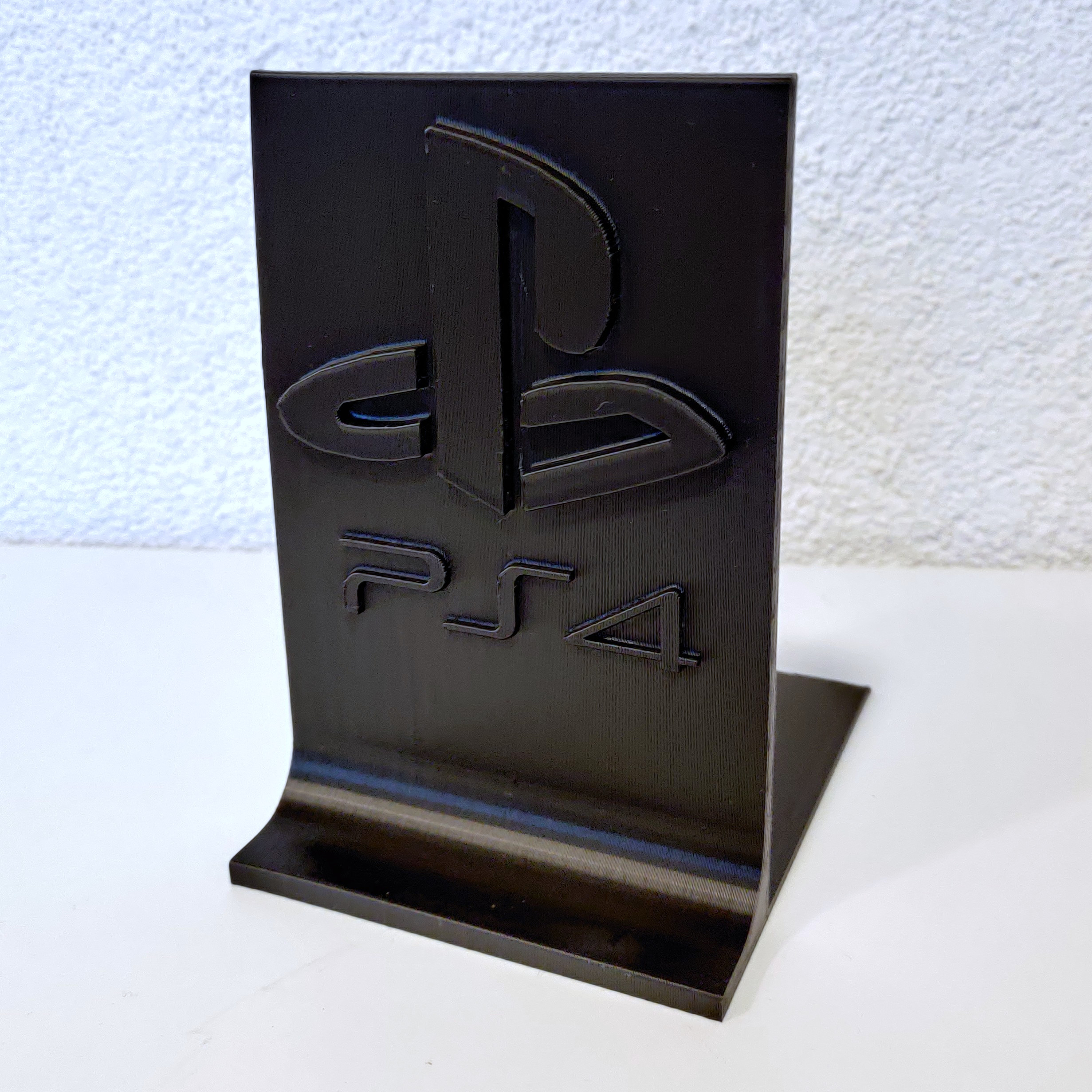 Playstation 4 and 3 gameholder or bookend