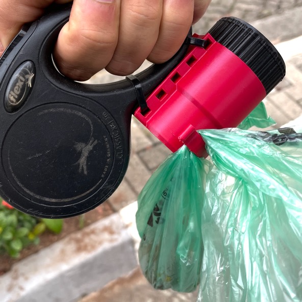 Universal leash dog poop bag dispenser with hook for used bags
