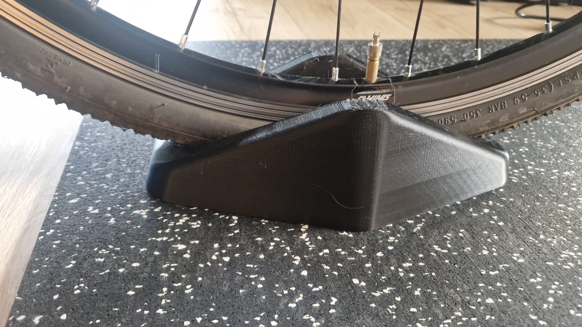 Low front wheel riser for bike trainer