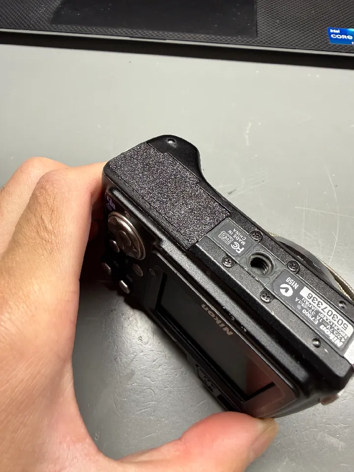 Nikon Coolpix 4200, 5200, 5900, and 7900 Battery Cover Door