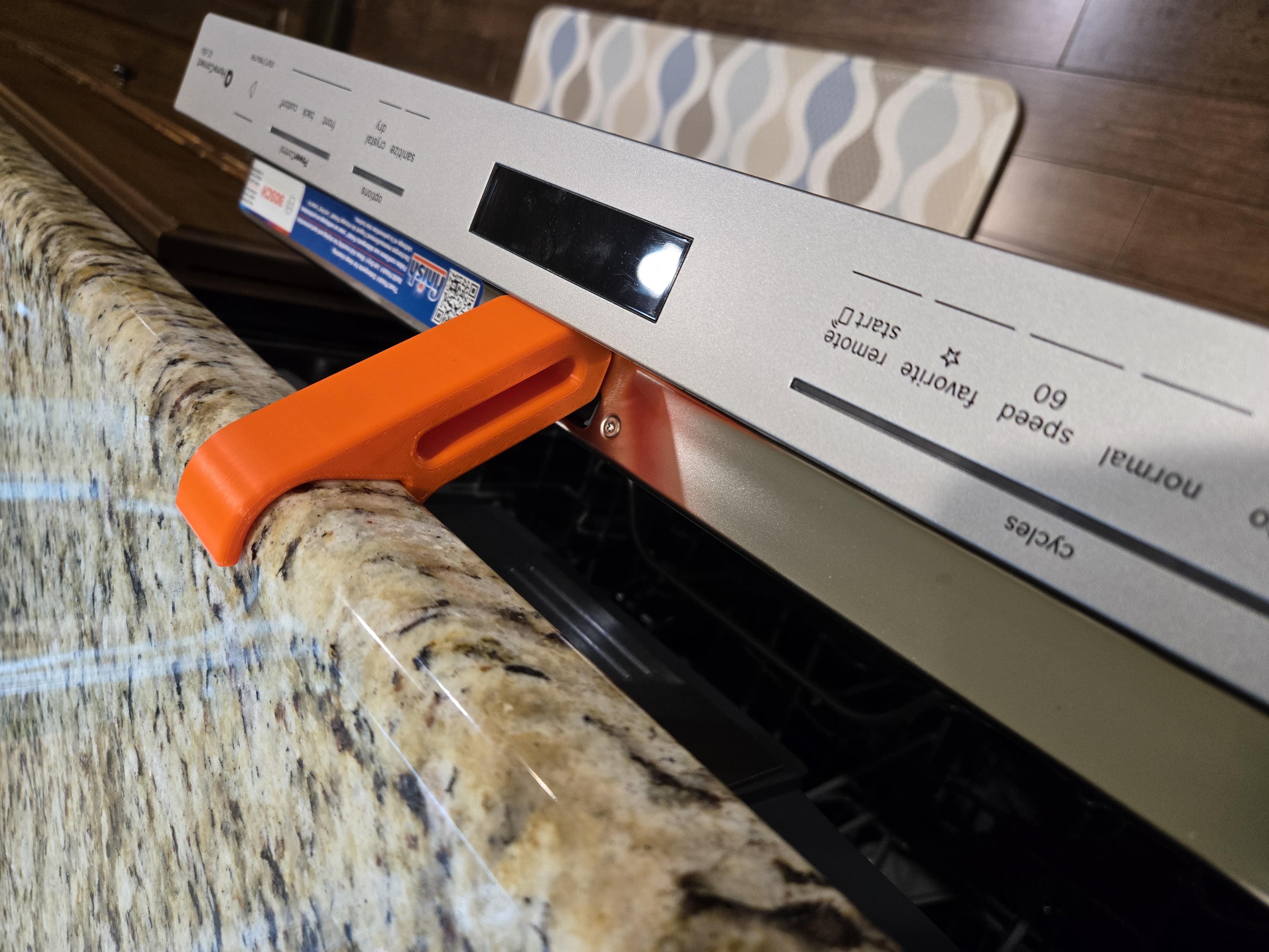 Dishwasher door prop