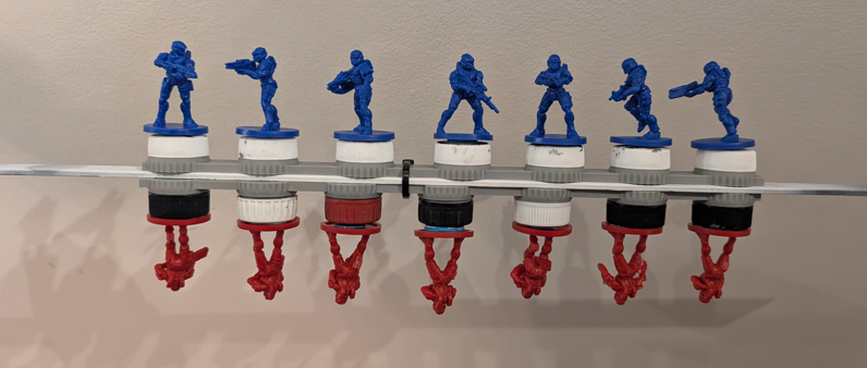 Bottle cap priming bar for miniatures