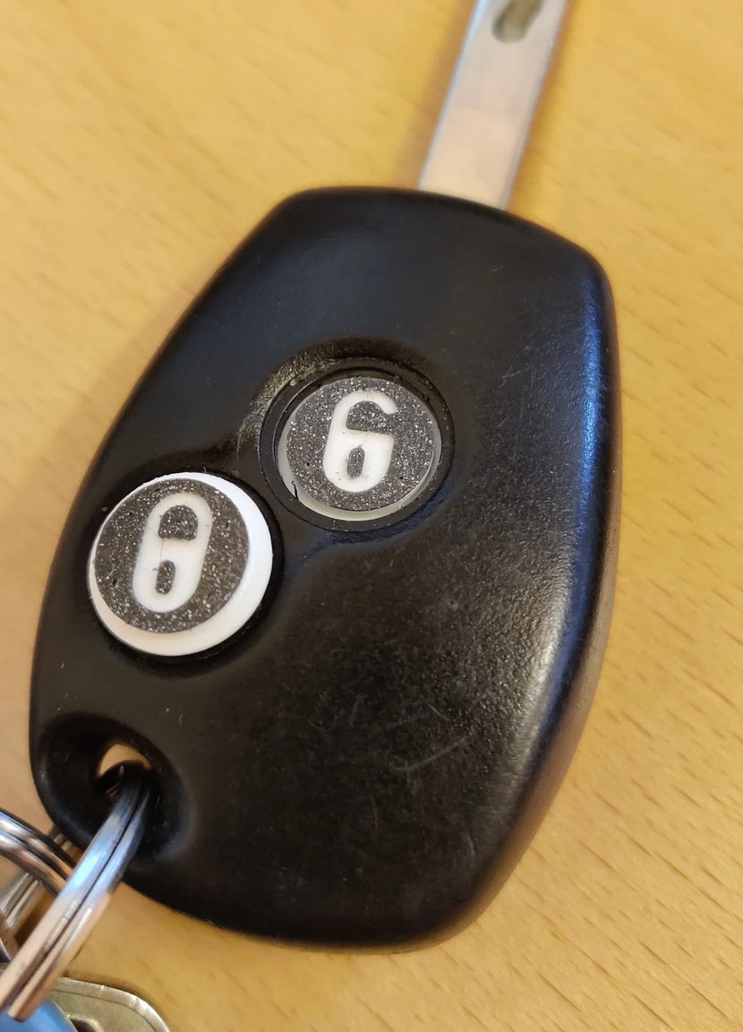 Replacement lock/unlock button for Renault key-fob