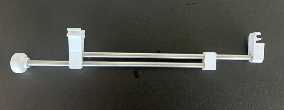 Sliding coat hook for wire rack shelving