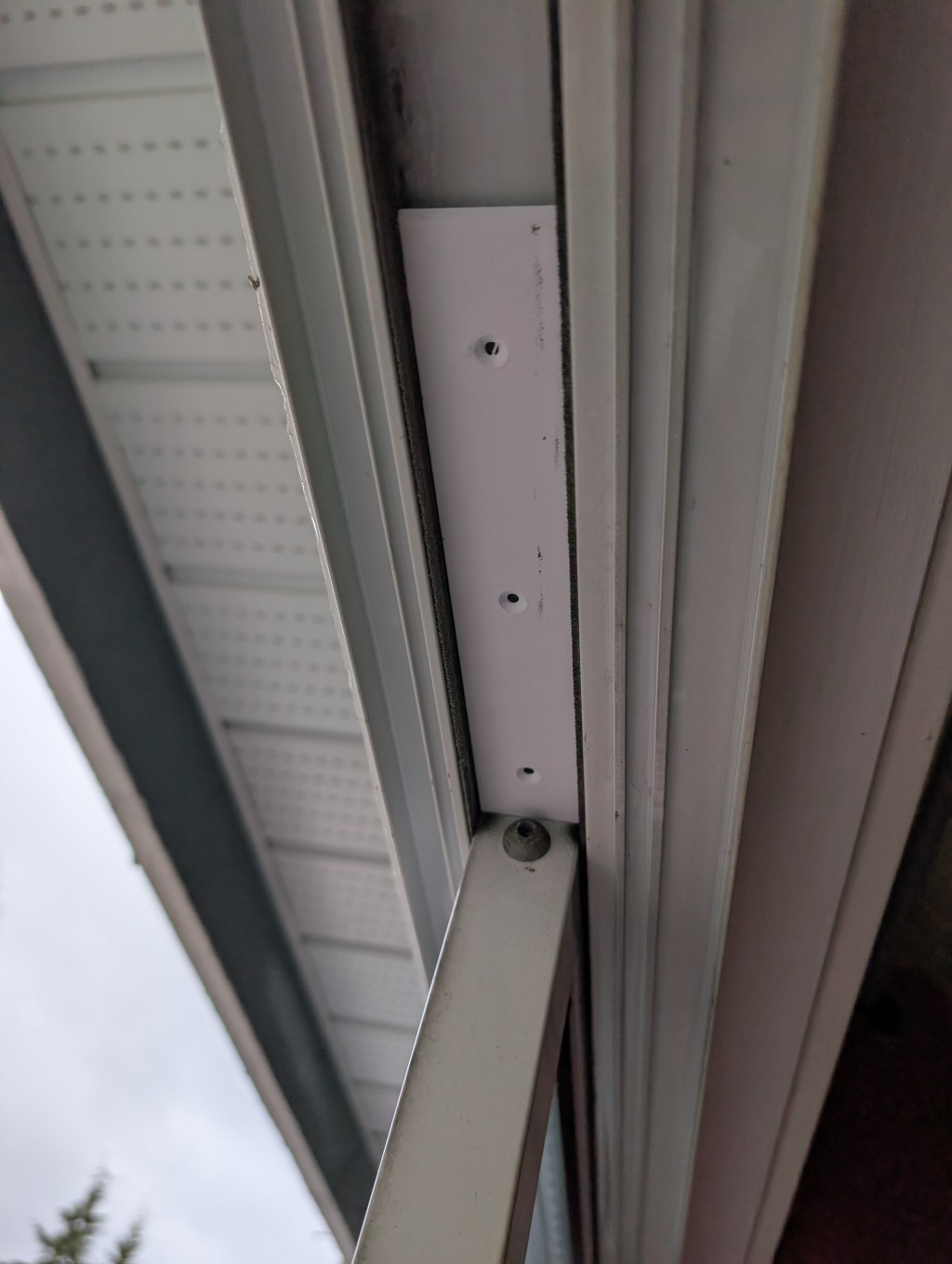 Anti-lift blocks for old sliding glass patio doors