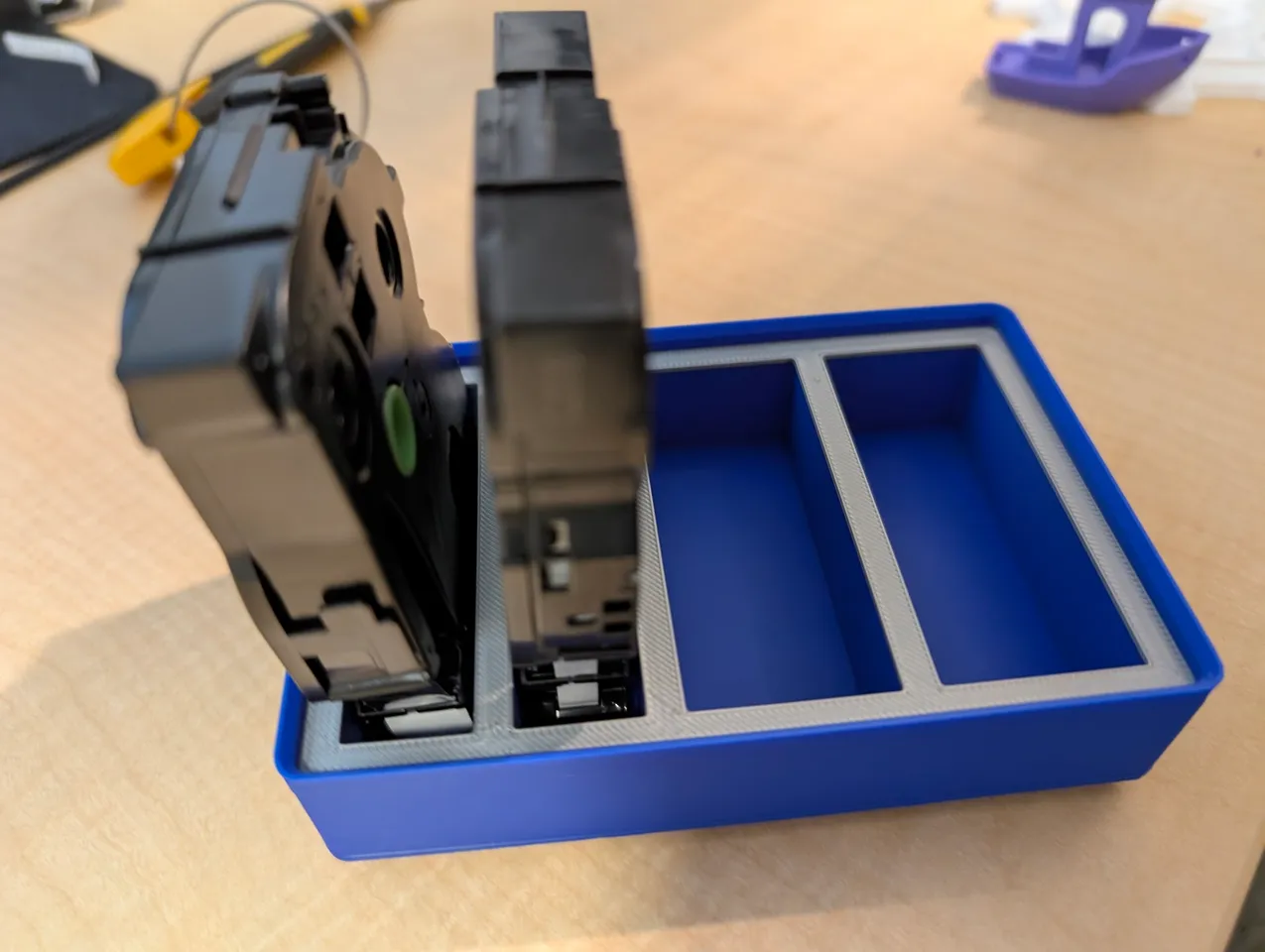 Gridfinity Brother TZe label maker tape storage by Paradox